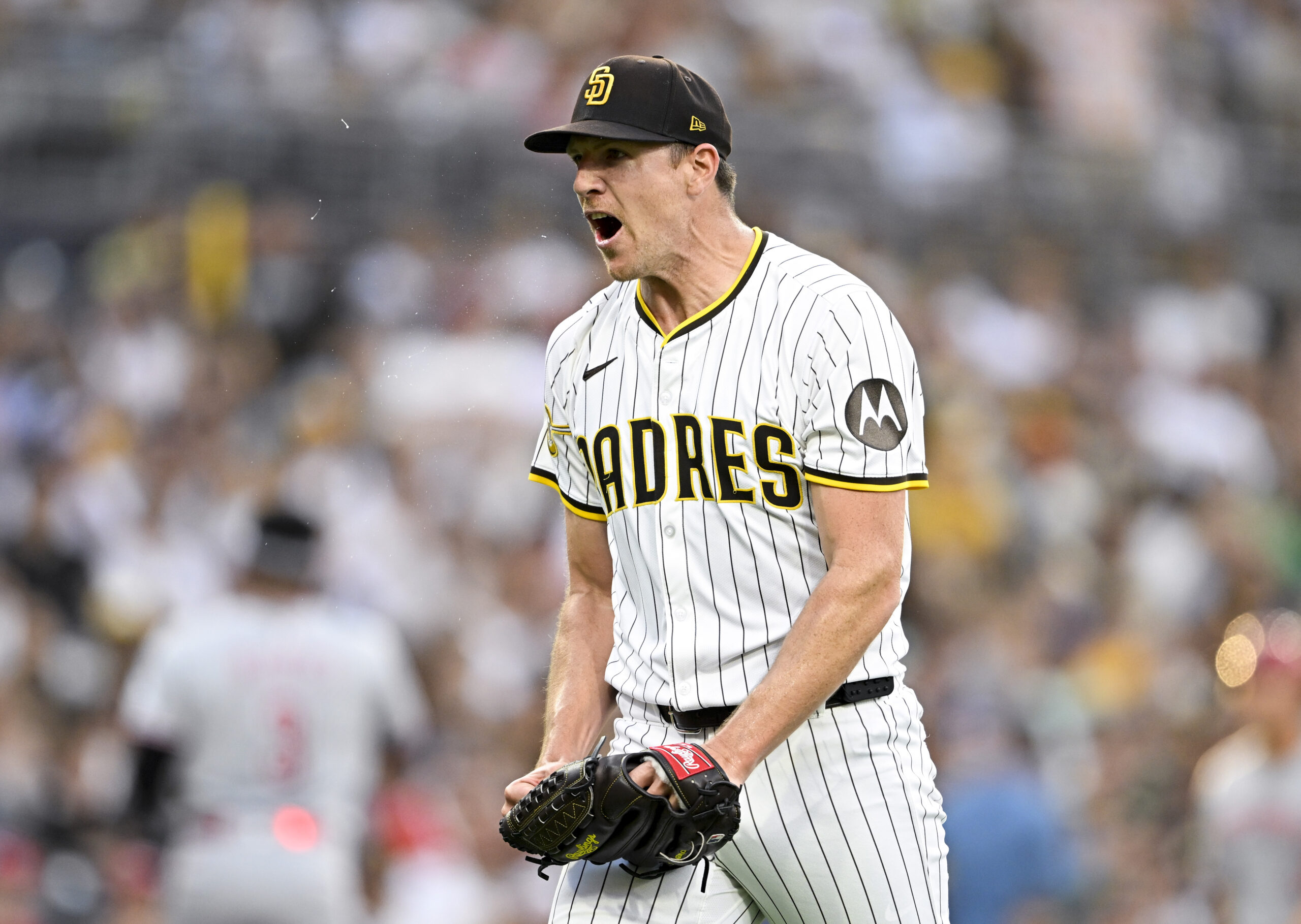 Sep 10, 2025; San Diego, California, USA; San Diego Padres starting pitcher Nick Pivetta (27) reacts after a strike out during the third inning against the Cincinnati Reds at Petco Park. Mandatory Credit: Denis Poroy-Imagn Images