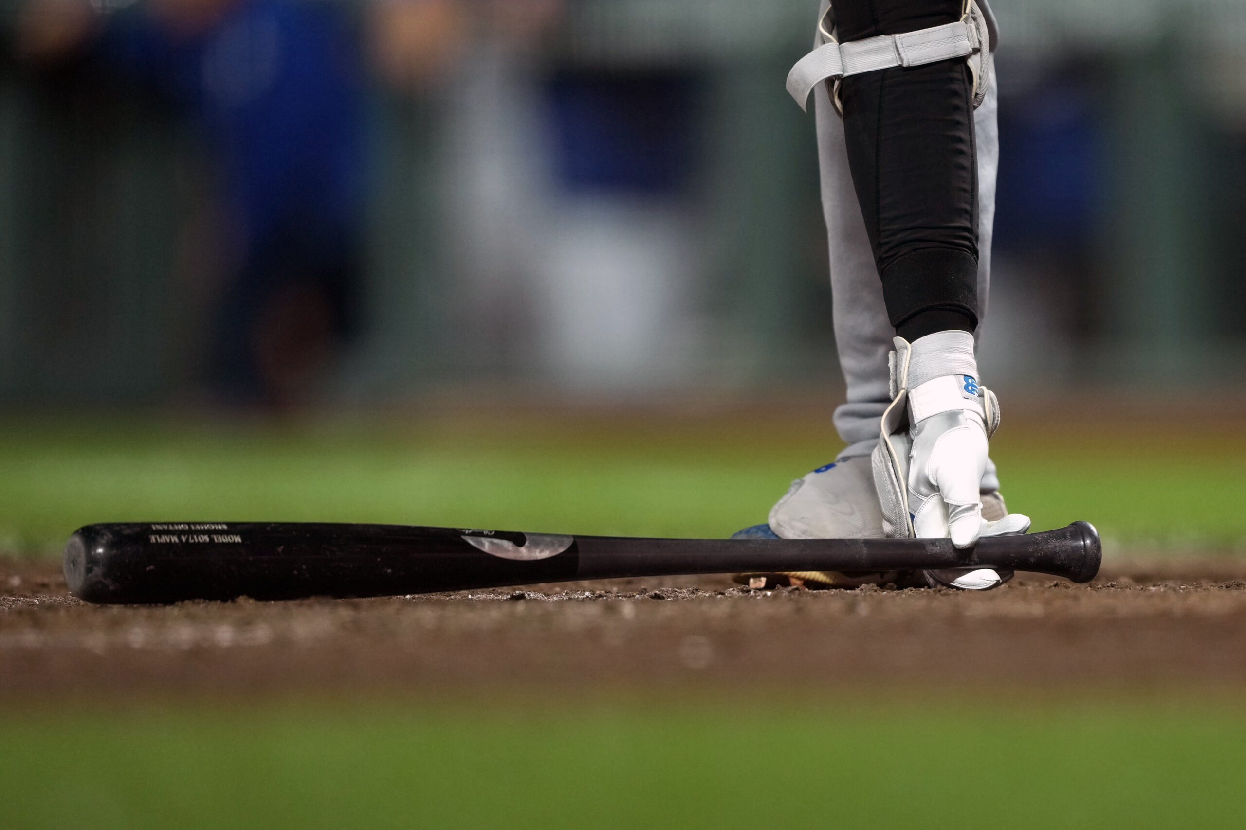 Sep 12, 2025; San Francisco, California, USA; Los Angeles Dodgers designated hitter Shohei Ohtani (17) places his bat on the ground before batting against the San Francisco Giants during the fifth inning at Oracle Park. Mandatory Credit: Darren Yamashita-Imagn Images