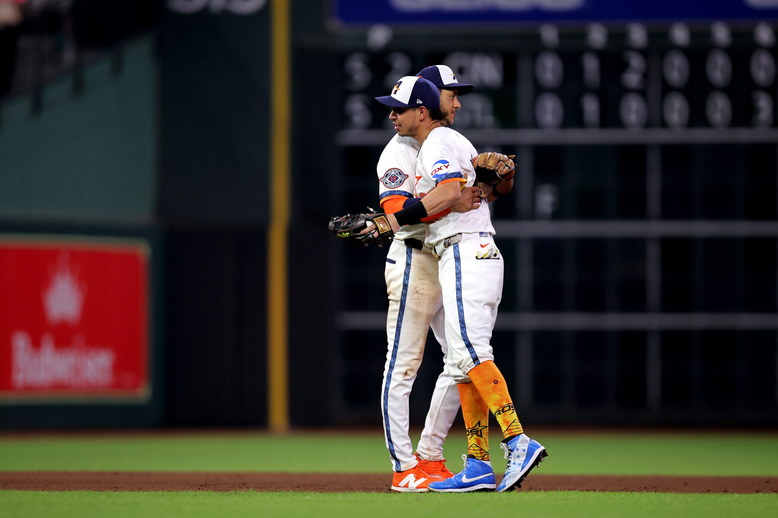 Sep 15, 2025; Houston, Texas, USA; Houston Astros third baseman Carlos Correa (1) is congratulated by Houston Astros shortstop Jeremy Pena (3) after the final out against the Texas Rangers during the ninth inning at Daikin Park. Mandatory Credit: Erik Williams-Imagn Images