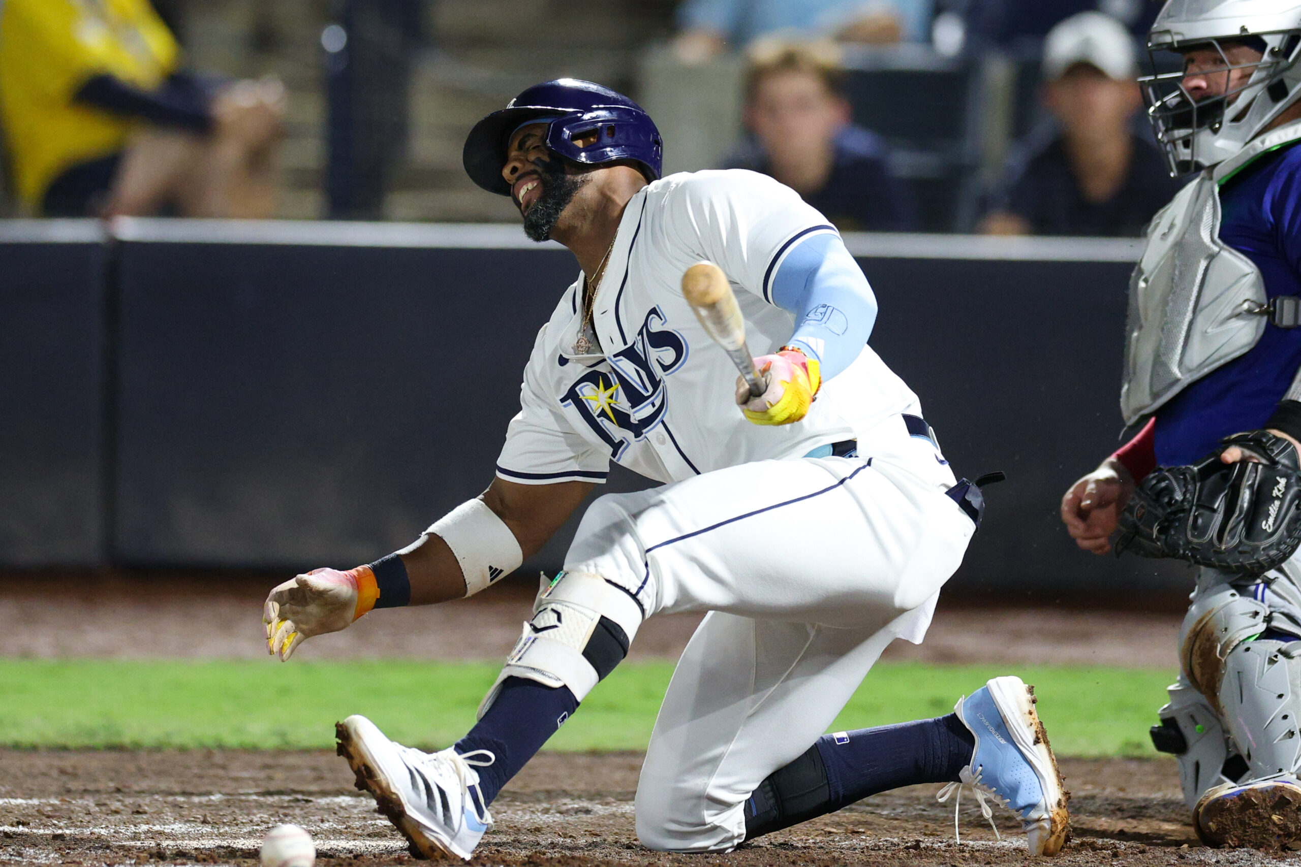 Sep 17, 2025; Tampa, Florida, USA; Tampa Bay Rays designated hitter Yandy Diaz (2) reacts after fouling a ball off his foot against the Toronto Blue Jays in the fifth inning at George M. Steinbrenner Field. Mandatory Credit: Nathan Ray Seebeck-Imagn Images