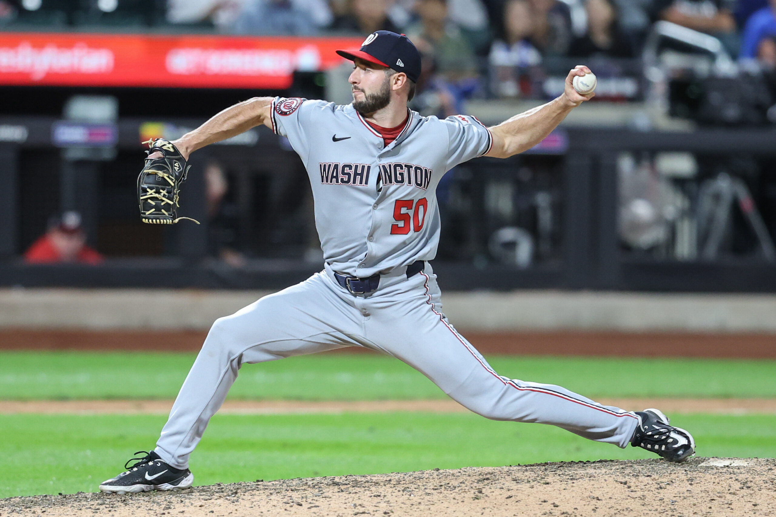 Sep 20, 2025; New York City, New York, USA; Washington Nationals relief pitcher PJ Poulin (50) pitches in the eleventh inning against the New York Mets at Citi Field. Mandatory Credit: Wendell Cruz-Imagn Images