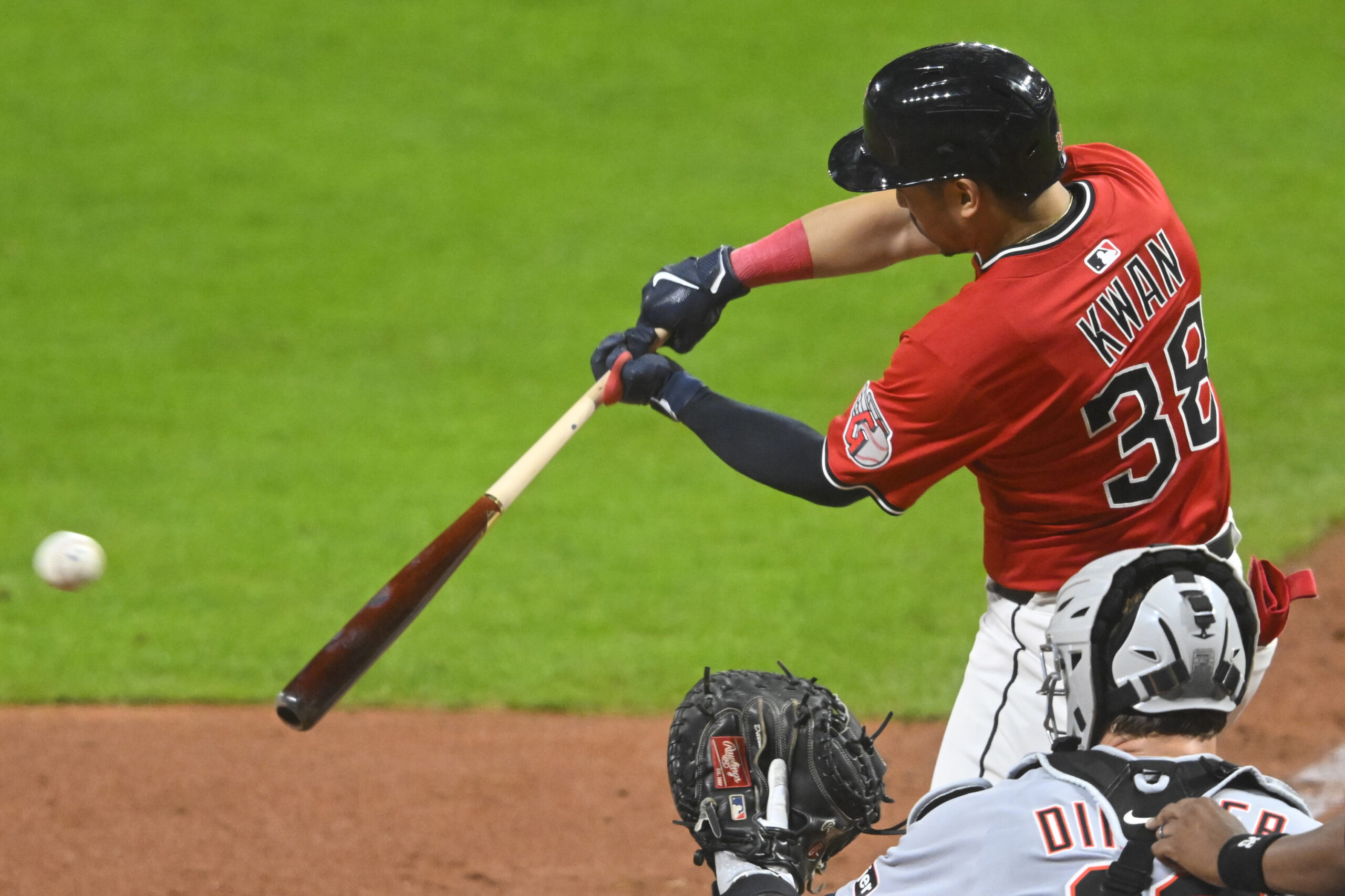 Sep 23, 2025; Cleveland, Ohio, USA; Cleveland Guardians left fielder Steven Kwan (38) doubles in the seventh inning against the Detroit Tigers at Progressive Field. Mandatory Credit: David Richard-Imagn Images