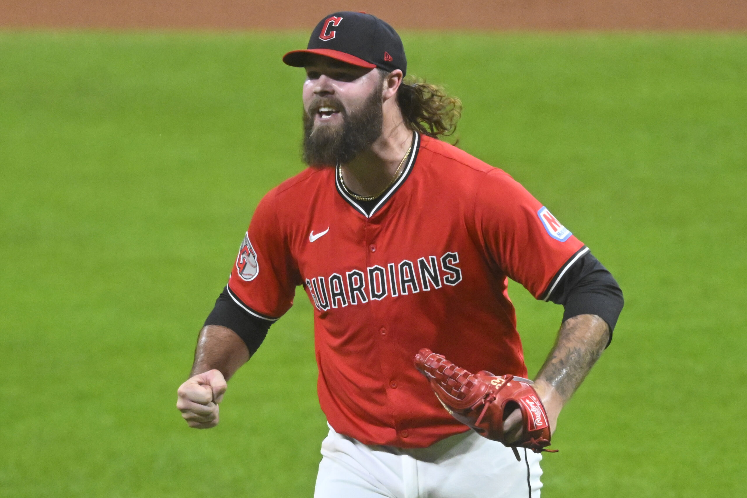 Sep 23, 2025; Cleveland, Ohio, USA; Cleveland Guardians relief pitcher Hunter Gaddis (33) reacts at the end of the eighth inning against the Detroit Tigers at Progressive Field. Mandatory Credit: David Richard-Imagn Images
