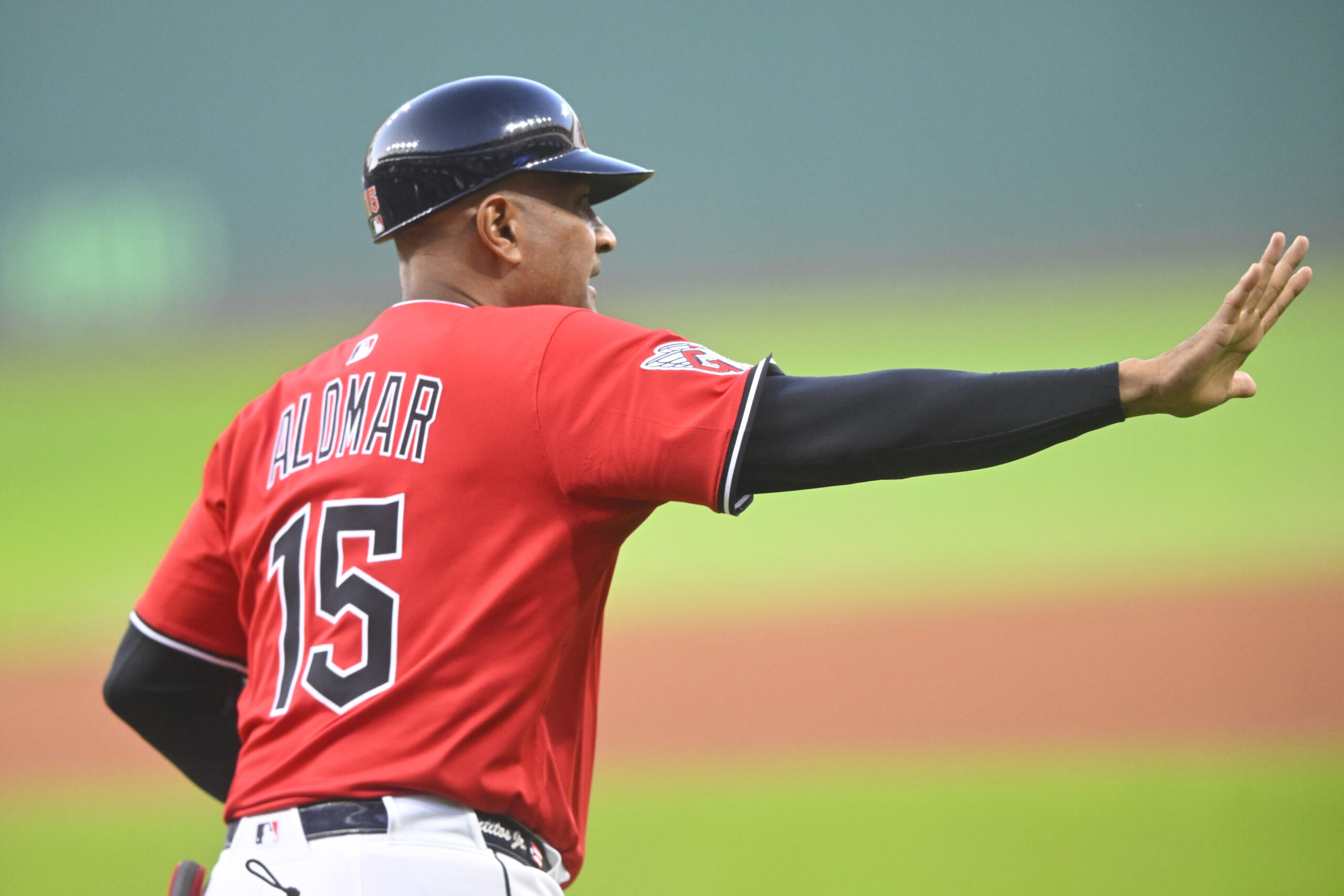 Sep 25, 2025; Cleveland, Ohio, USA; Cleveland Guardians first base coach Sandy Alomar Jr. (15) runs on the field in the first inning against the Detroit Tigers at Progressive Field. Mandatory Credit: David Richard-Imagn Images