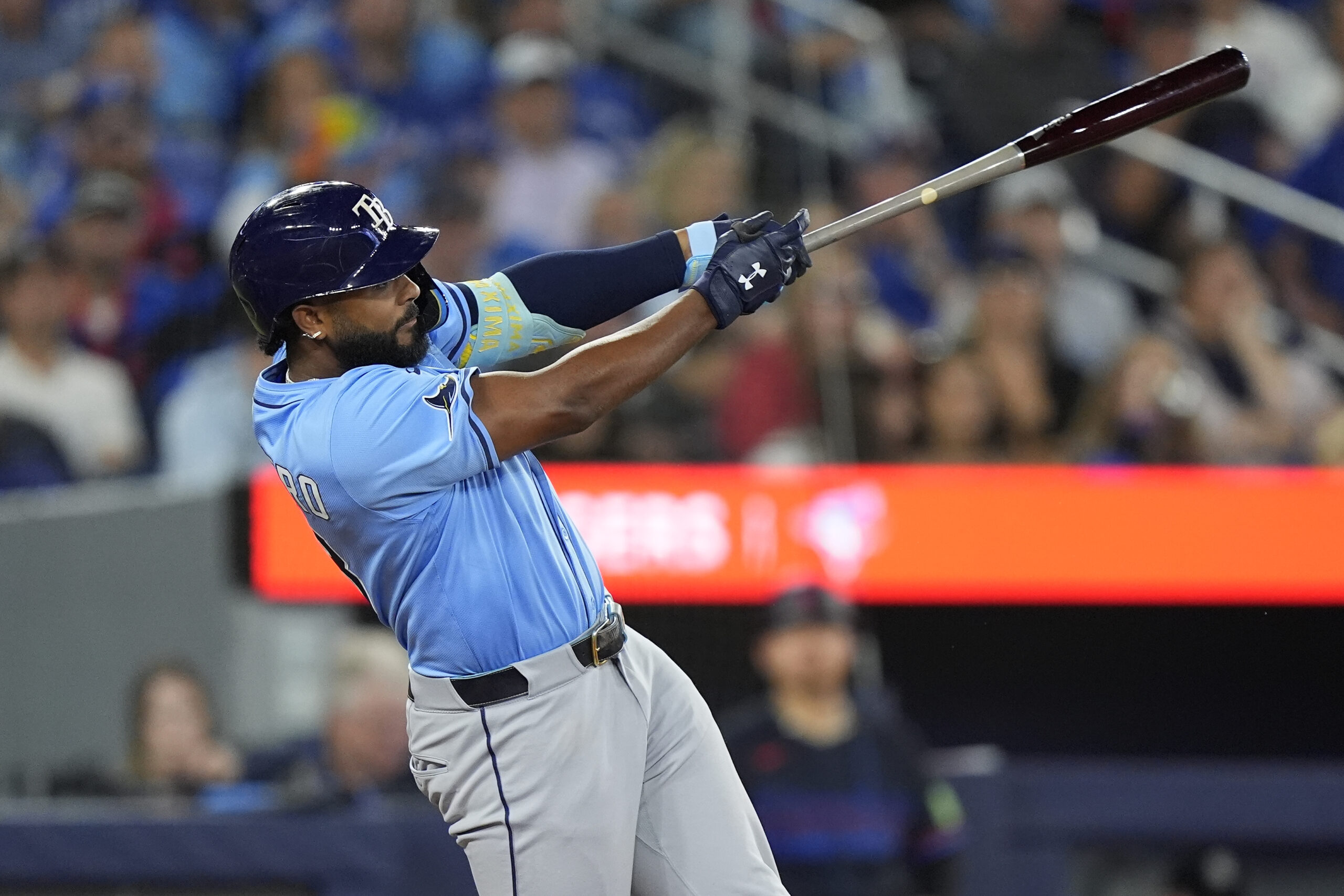Sep 26, 2025; Toronto, Ontario, CAN; Tampa Bay Rays third baseman Junior Caminero (13) hits a single against the Toronto Blue Jays  during the eighth inning at Rogers Centre. Mandatory Credit: John E. Sokolowski-Imagn Images