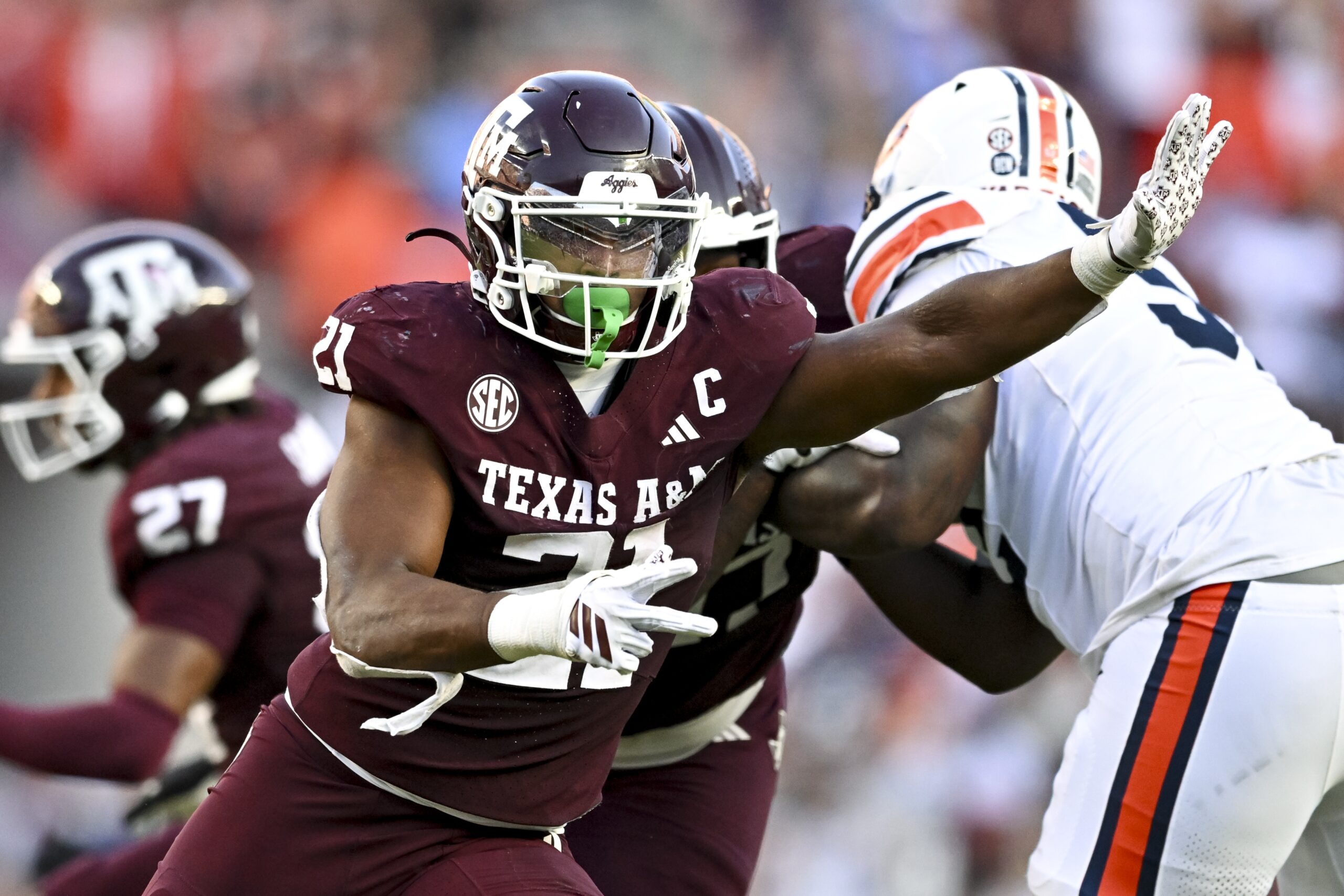 Sep 27, 2025; College Station, Texas, USA; Texas A&M Aggies linebacker Taurean York (21) defends in coverage against the Auburn Tigers during the fourth quarter at Kyle Field. Mandatory Credit: Maria Lysaker-Imagn Images