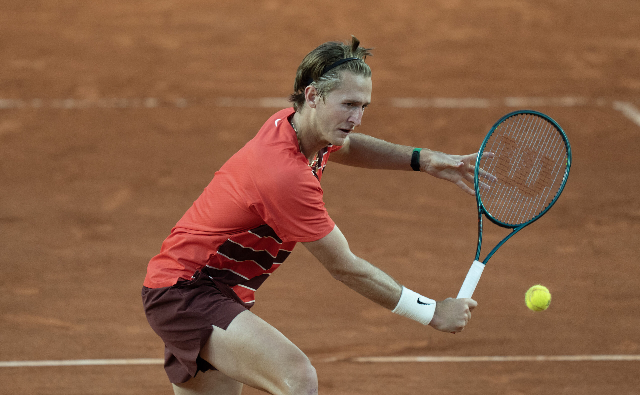 May 30, 2025; Paris, FR; Sebastian Korda of the United States returns a shot during his match against Frances Tiafoe of the United States on day six at Roland Garros Stadium. Mandatory Credit: Susan Mullane-Imagn Images