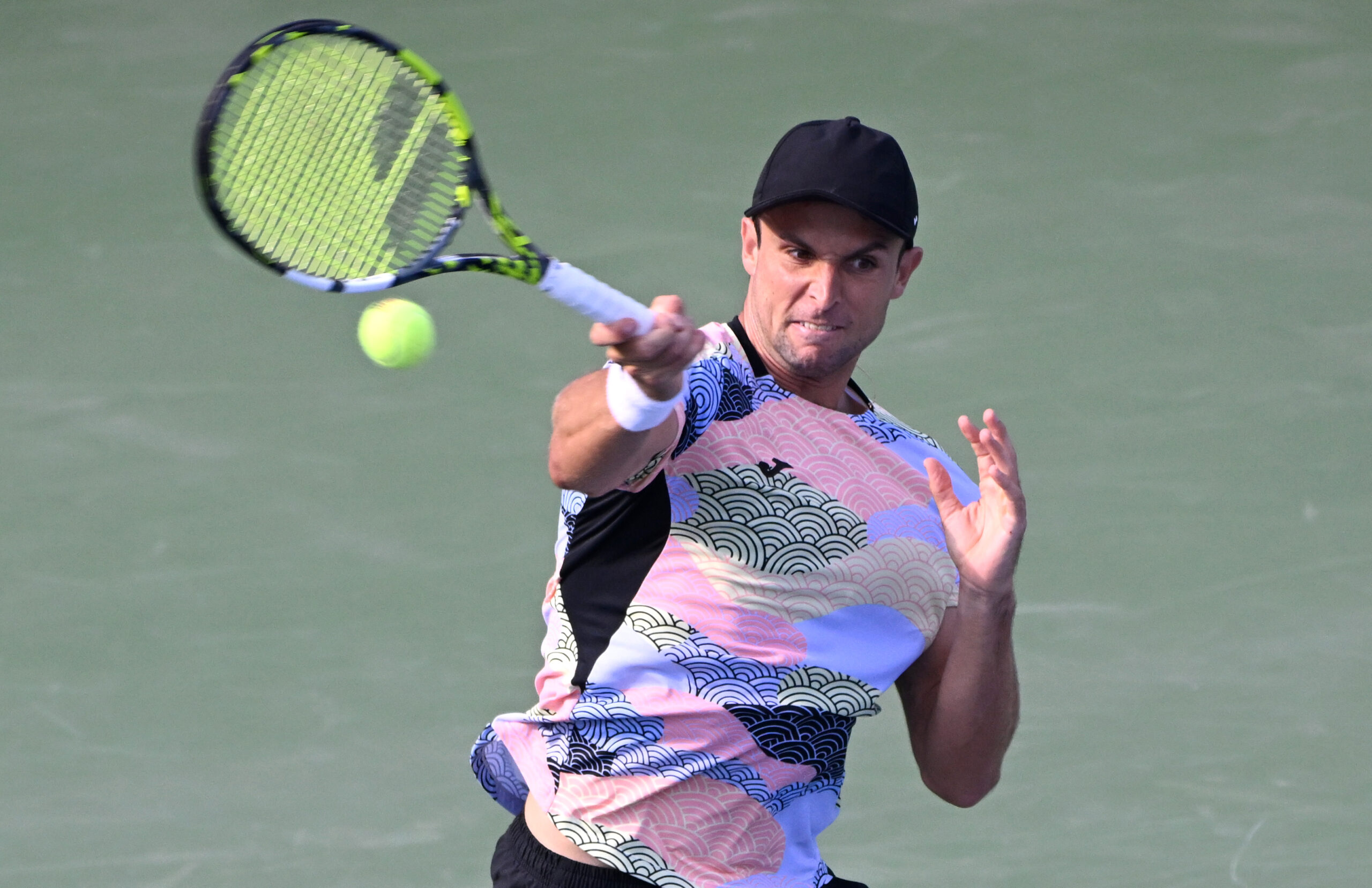 Aug 1, 2025; Toronto, ON, Canada; Aleksandar Vukic (AUS)  plays a shot against Frances Tiafoe (USA) during third round play at Sobeys Stadium. Mandatory Credit: Dan Hamilton-Imagn Images