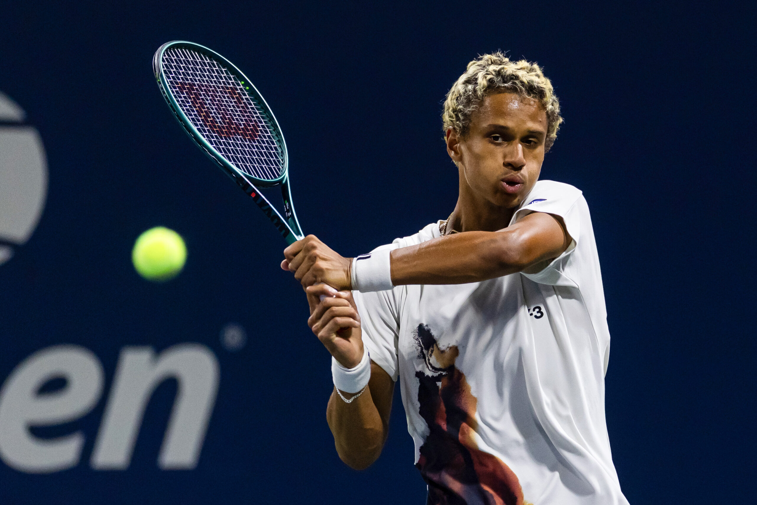 Aug 25, 2025; Flushing, NY, USA; Gabriel Diallo of Canada in action against Damir Dzumhur of Bosnia and Herzegovina in the first round of the men’s singles at the US Open at Billie Jean King National Tennis Centre. Mandatory Credit: Mike Frey-Imagn Images