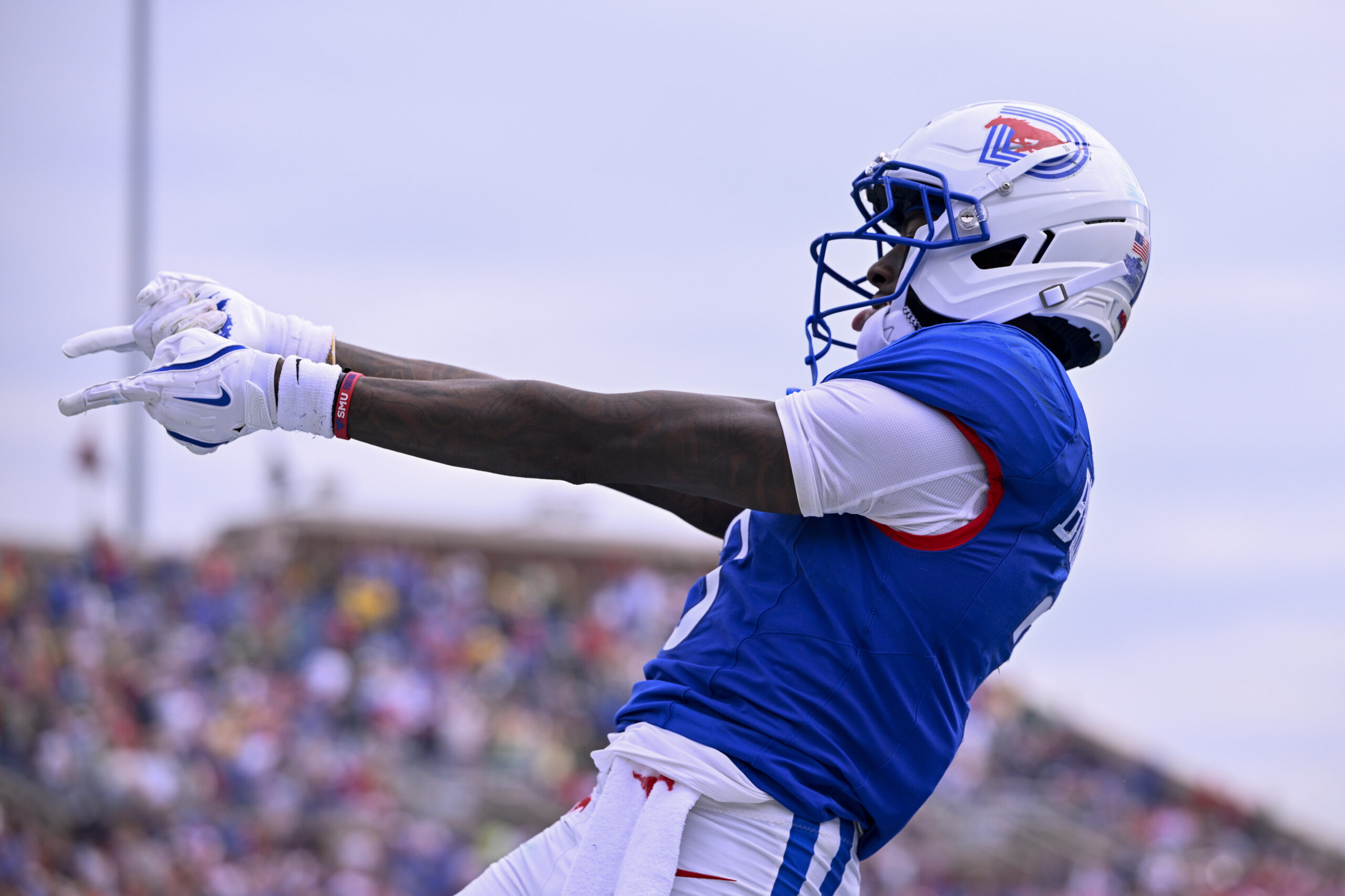 Sep 6, 2025; Dallas, Texas, USA; SMU Mustangs wide receiver Romello Brinson (3) celebrates after he scores a touchdown during the first overtime against the Baylor Bears at Gerald J. Ford Stadium. Mandatory Credit: Jerome Miron-Imagn Images