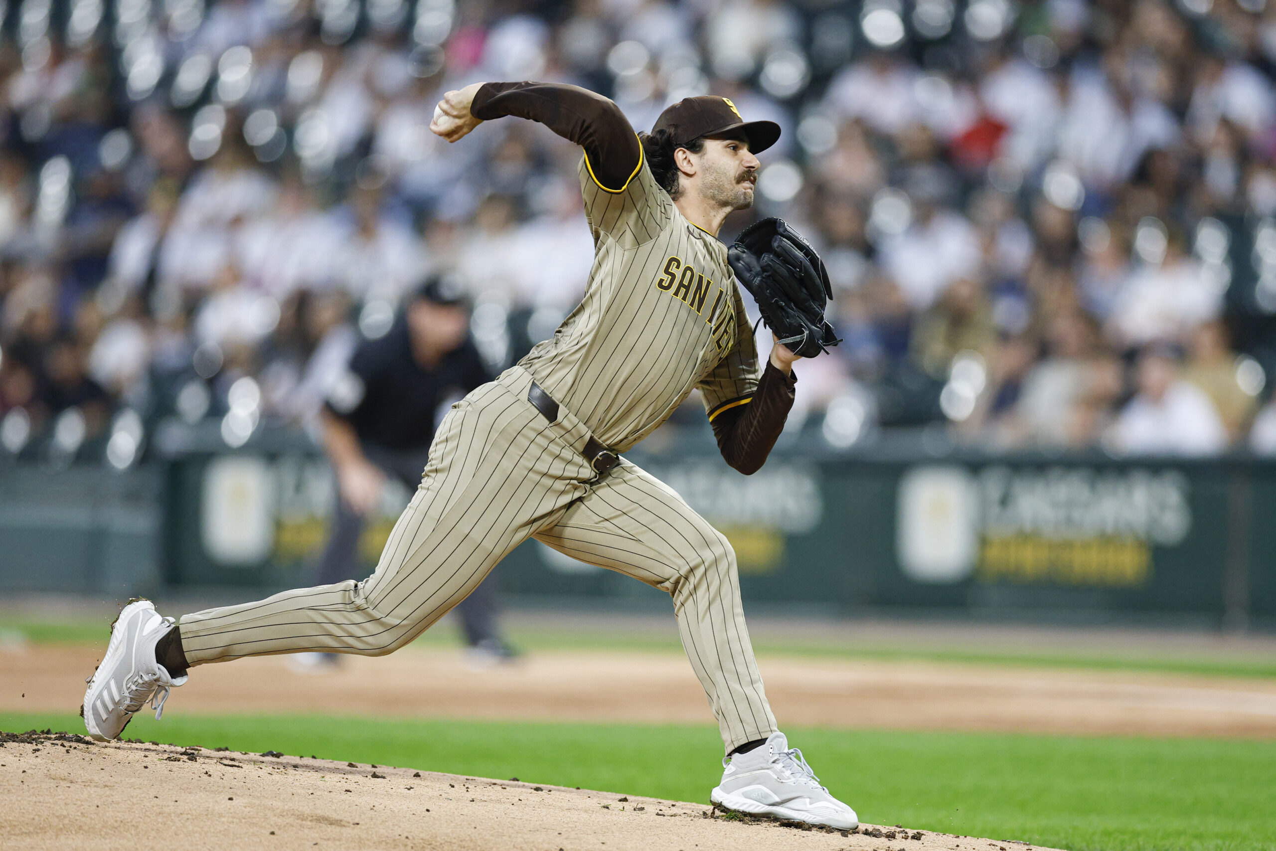 Sep 19, 2025; Chicago, Illinois, USA; San Diego Padres starting pitcher Dylan Cease (84) delivers a pitch against the Chicago White Sox during the first inning at Rate Field. Mandatory Credit: Kamil Krzaczynski-Imagn Images