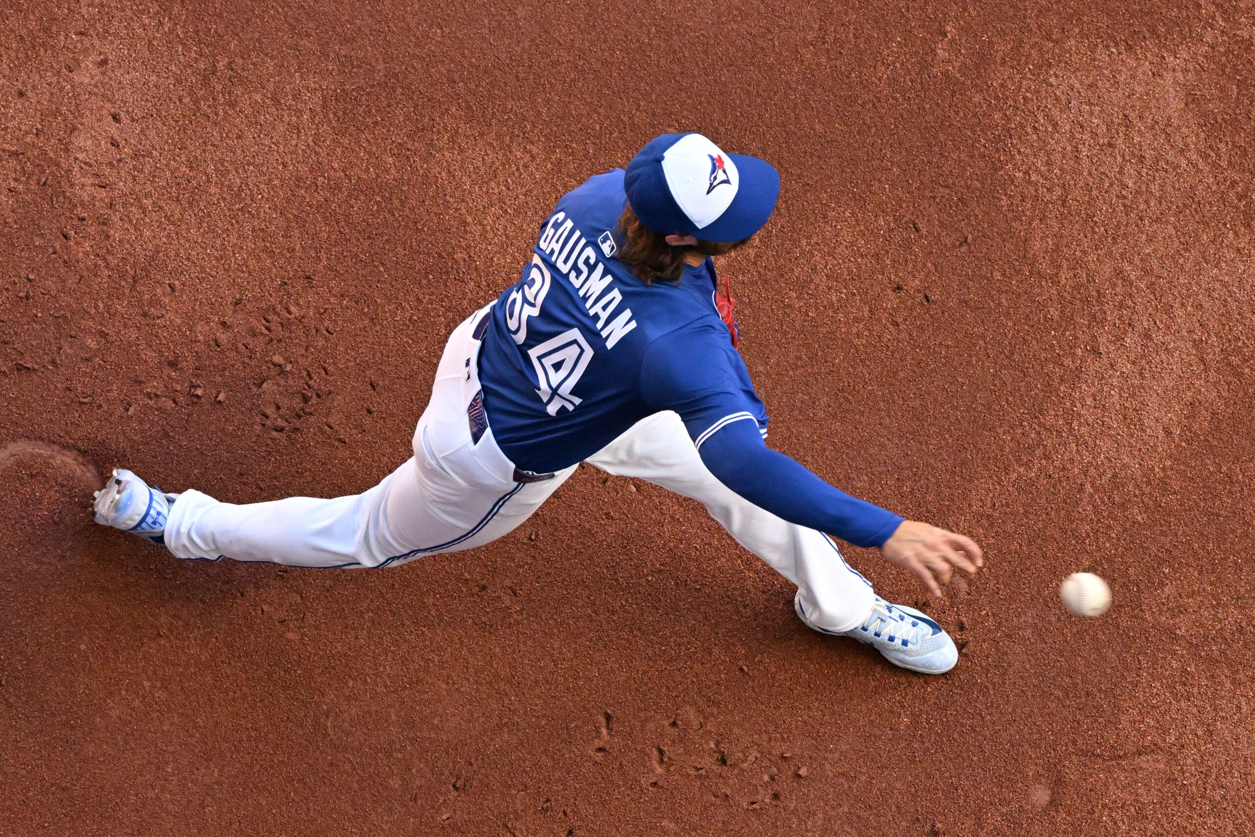 Sep 28, 2025; Toronto, Ontario, CAN; Toronto Blue Jays starting pitcher Kevin Gausman (34) warms up before playing the Tampa Bay Rays at Rogers Centre. Mandatory Credit: Dan Hamilton-Imagn Images