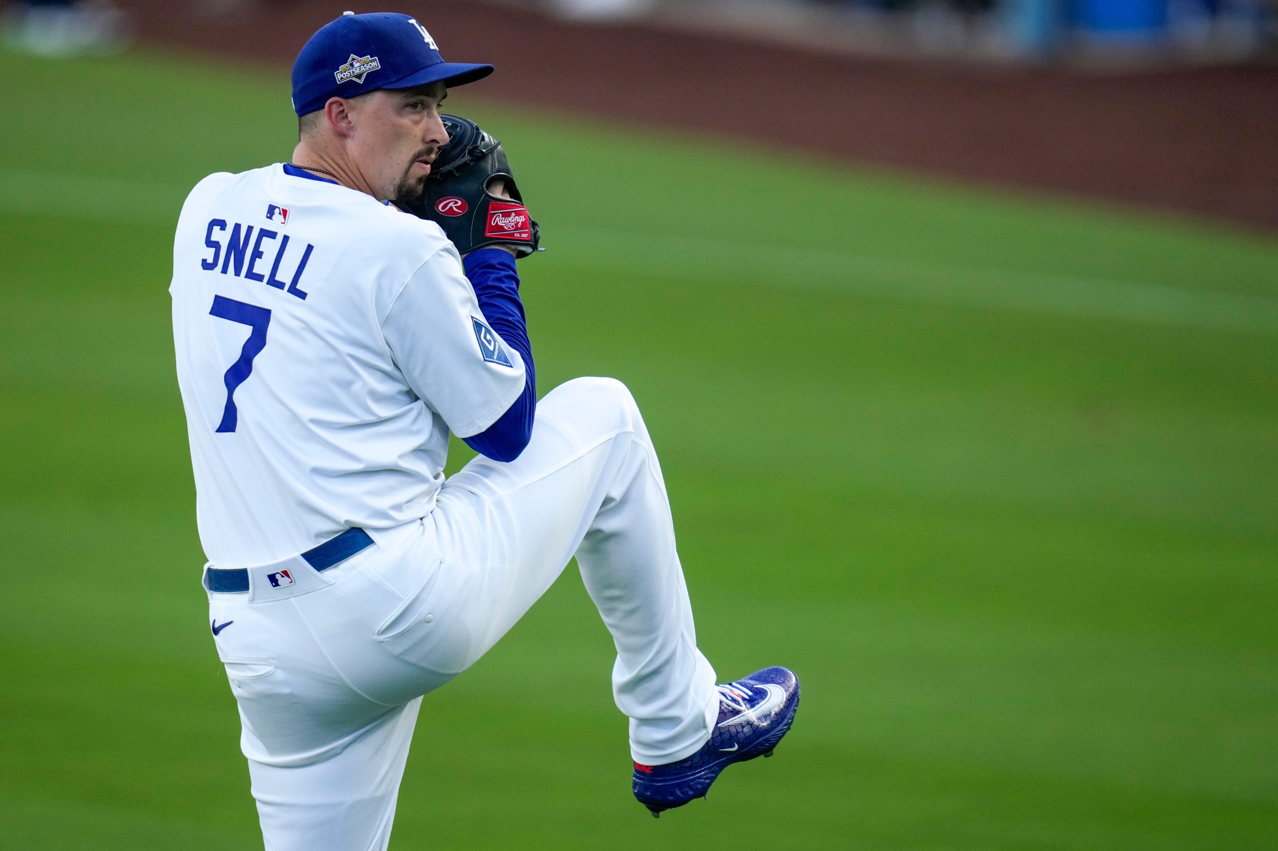 Los Angeles Dodgers starting pitcher Blake Snell (7) warms up before the first inning of the MLB National League Wild Card Game 1 between the Los Angeles Dodgers and the Cincinnati Reds at Dodger Stadium in Los Angeles on Tuesday, Sept. 30, 2025. The Dodgers won game 1 of the series, 10-5.