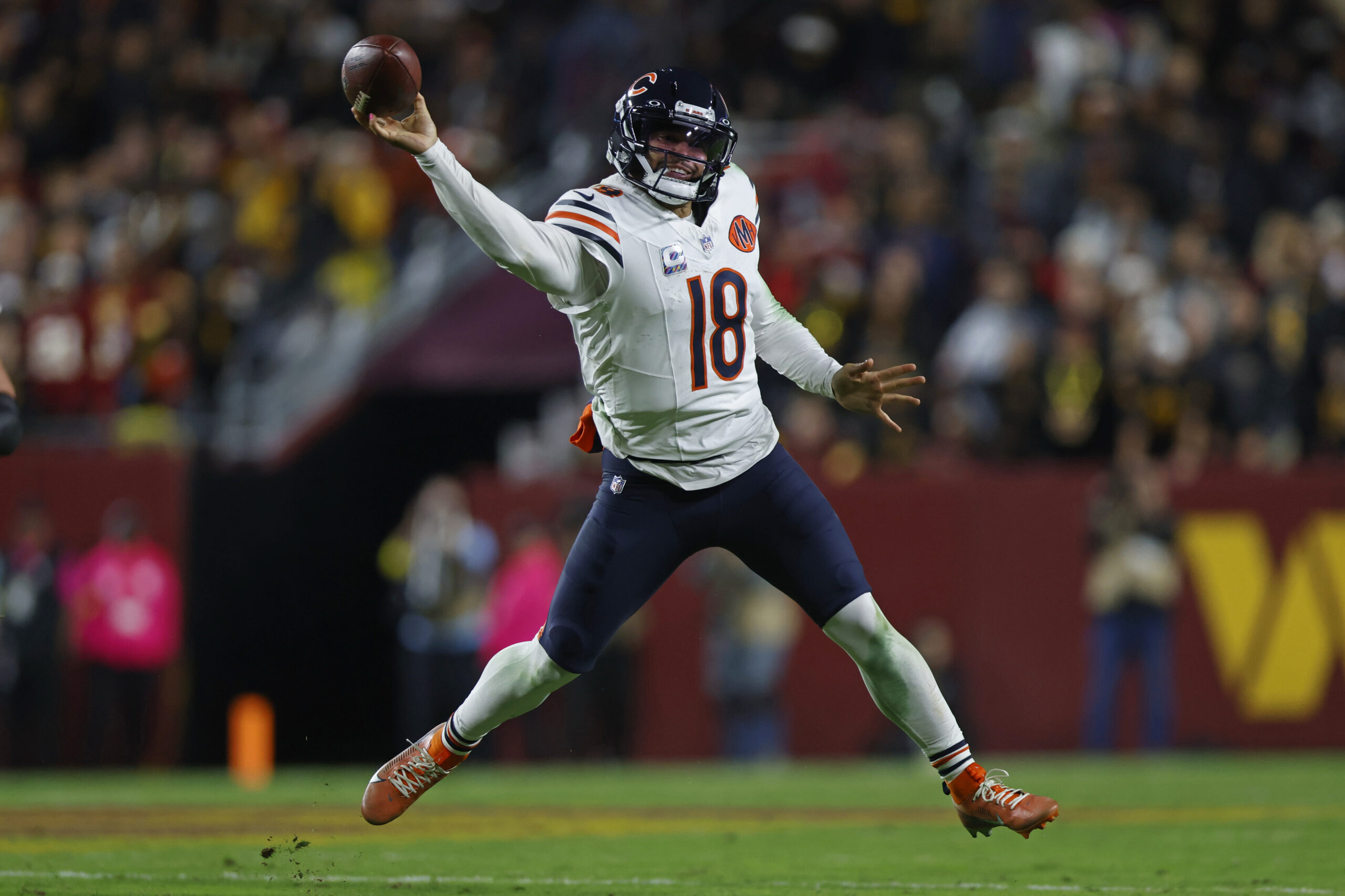 Oct 13, 2025; Landover, Maryland, USA; Chicago Bears quarterback Caleb Williams (18) throws the ball against the Washington Commanders during the third quarter at Northwest Stadium. Mandatory Credit: Peter Casey-Imagn Images