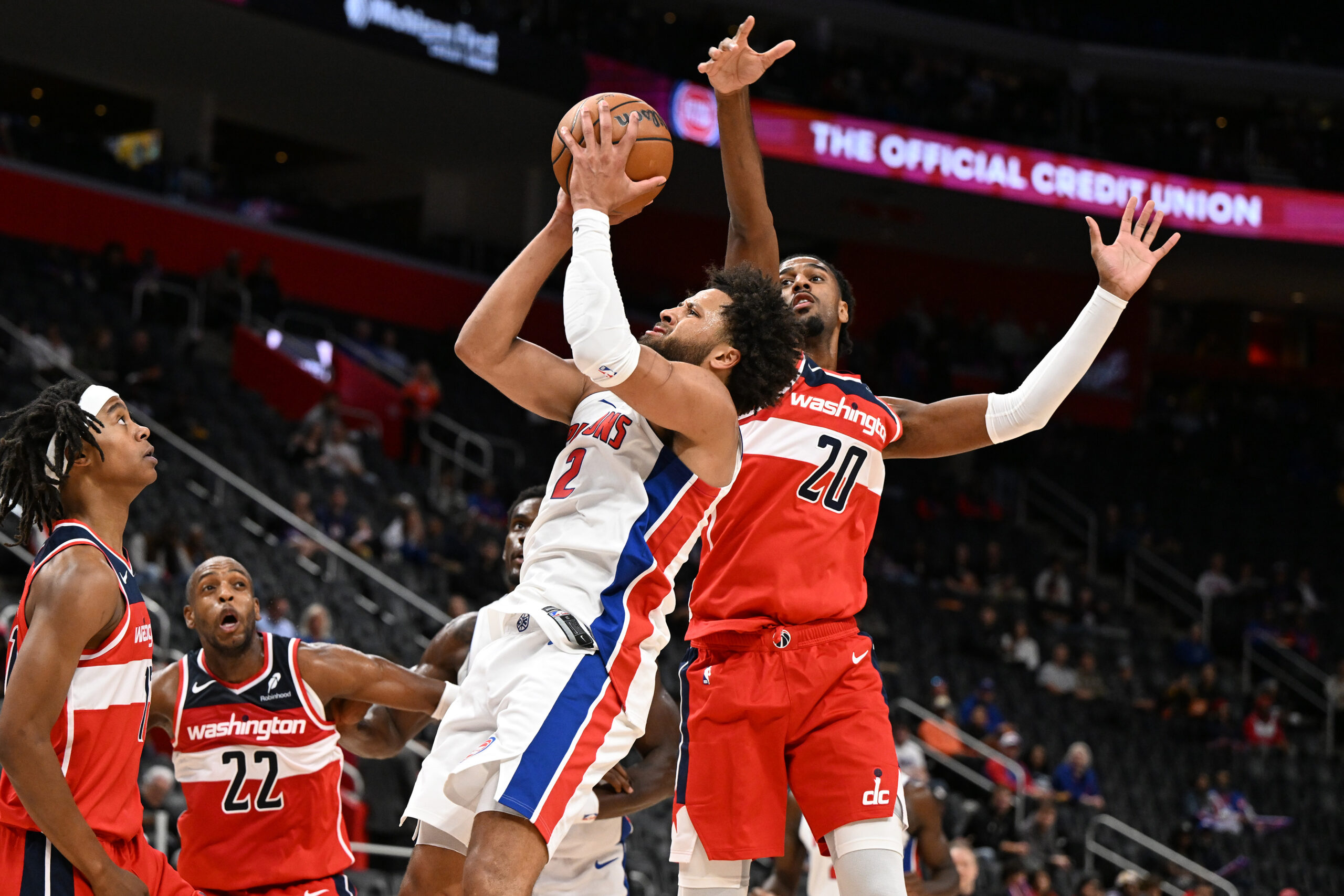 Oct 16, 2025; Detroit, Michigan, USA; Detroit Pistons guard Cade Cunningham (2) shoots the ball against Washington Wizards center Alex Sarr (20) in the first quarter at Little Caesars Arena. Mandatory Credit: Lon Horwedel-Imagn Images