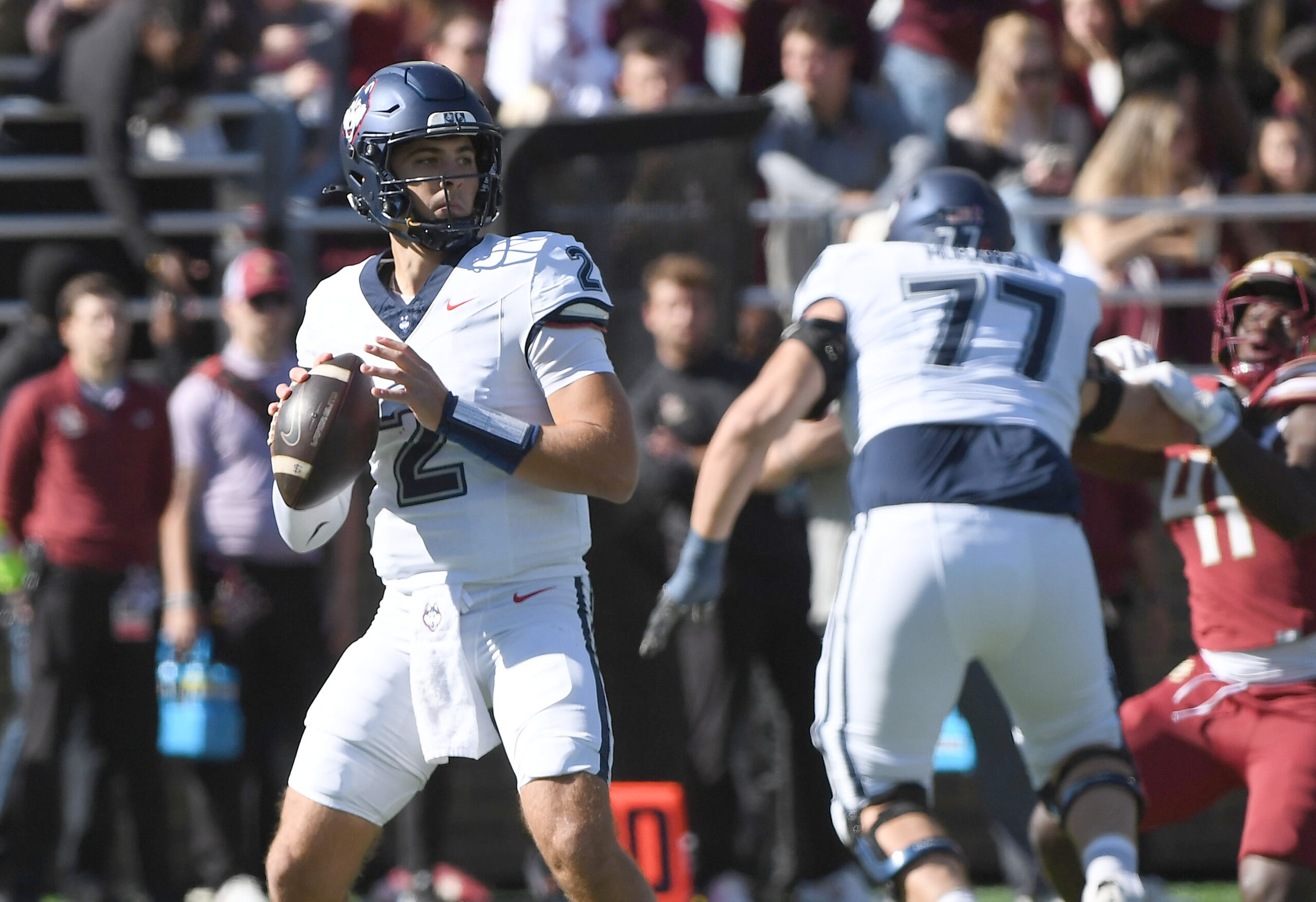 Oct 18, 2025; Chestnut Hill, Massachusetts, USA; UConn Huskies quarterback Joe Fagnano (2) looks to pass the ball during the first half against the Boston College Eagles at Alumni Stadium. Mandatory Credit: Bob DeChiara-Imagn Images