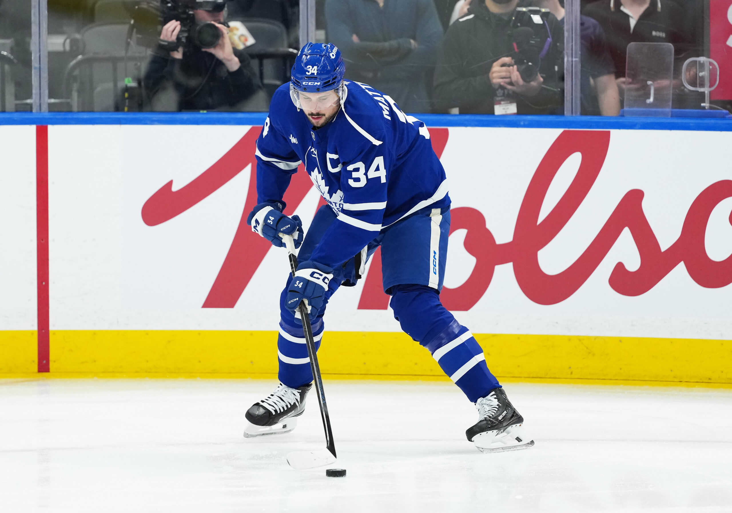 Oct 18, 2025; Toronto, Ontario, CAN; Toronto Maple Leafs center Auston Matthews (34) controls the puck during warmups before a game against the Seattle Kraken at Scotiabank Arena. Mandatory Credit: Nick Turchiaro-Imagn Images