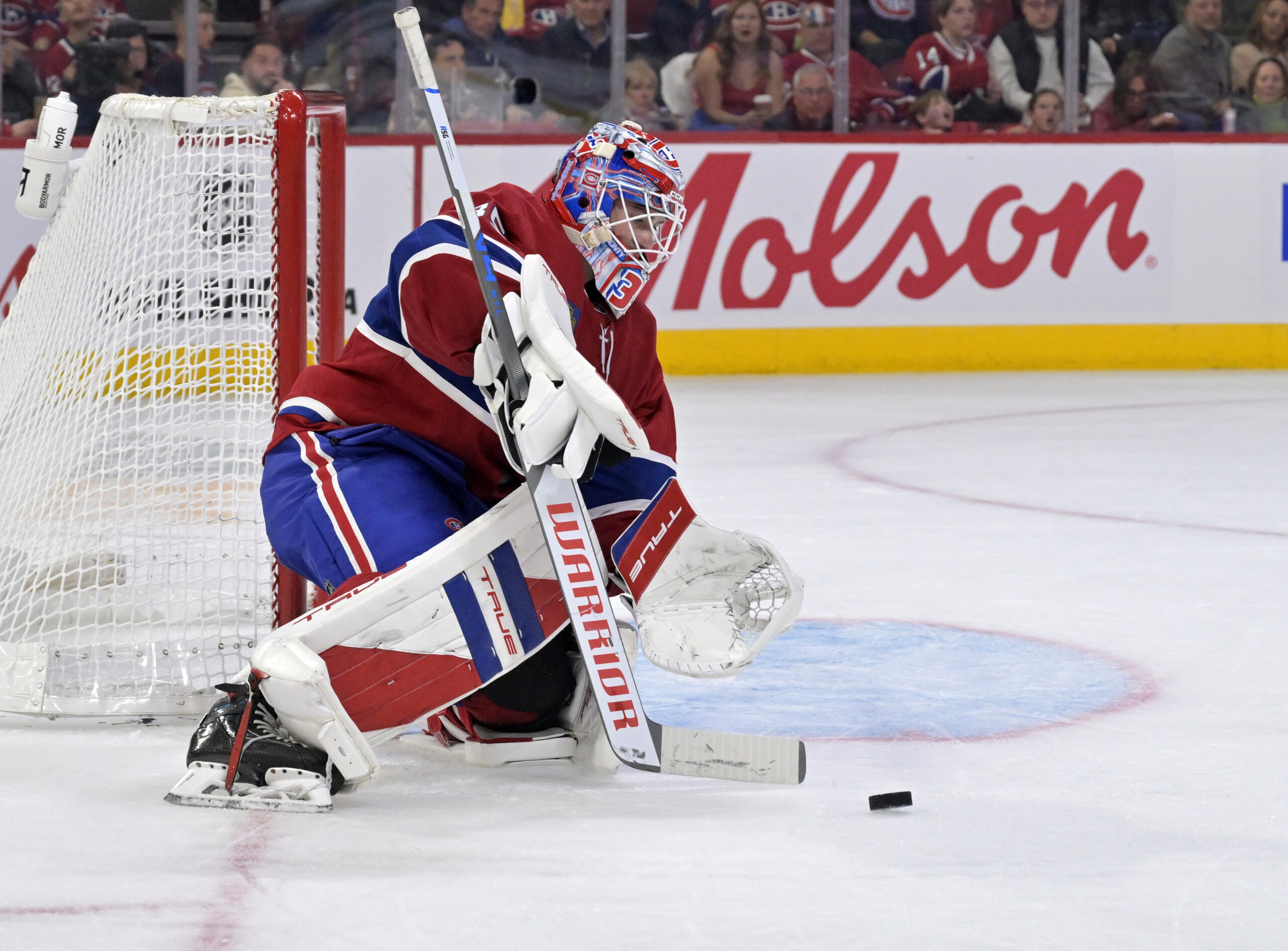 Oct 18, 2025; Montreal, Quebec, CAN; Montreal Canadiens goalie Sam Montembeault (35) makes a save against the New York Rangers during the third period at the Bell Centre. Mandatory Credit: Eric Bolte-Imagn Images