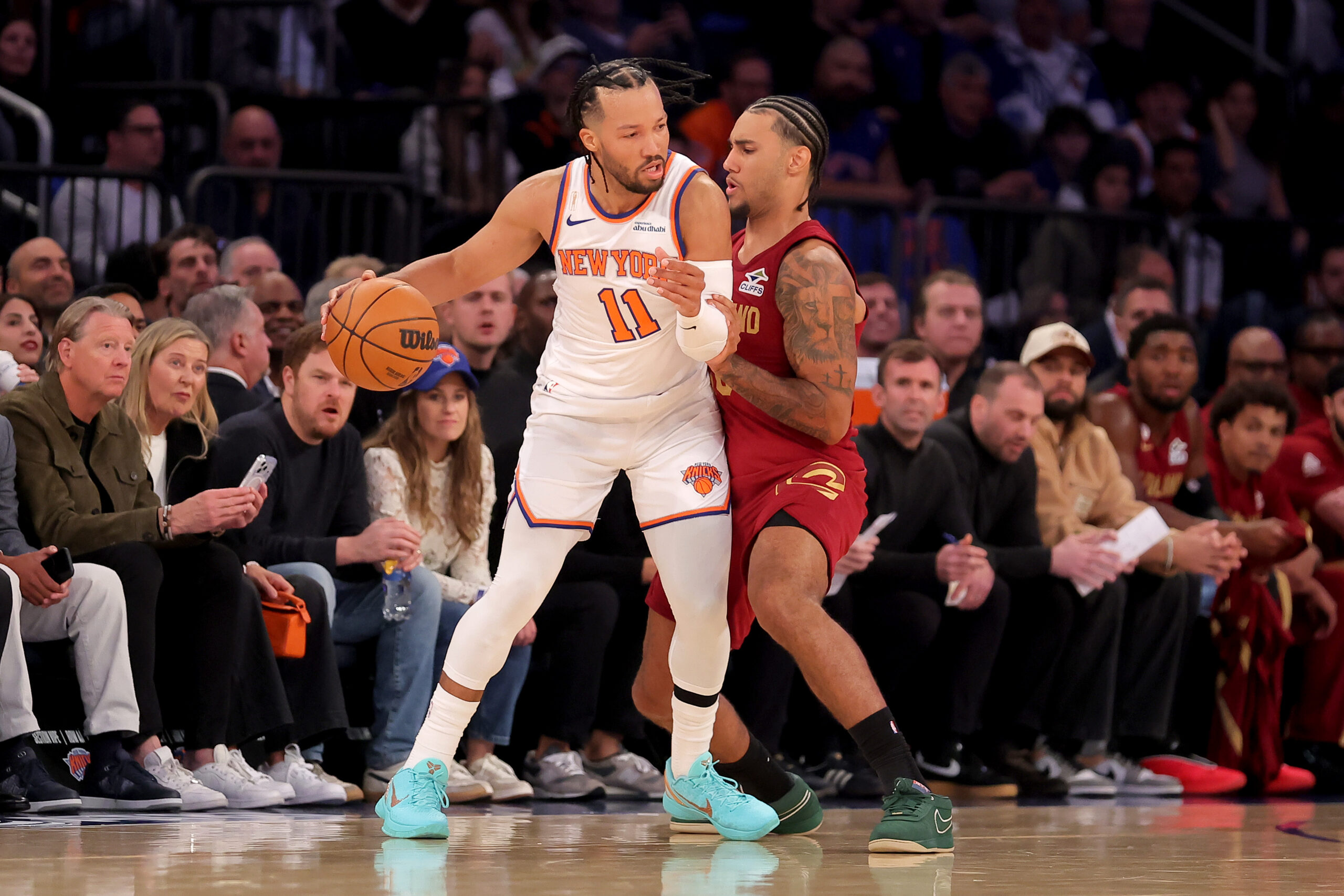 Oct 22, 2025; New York, New York, USA; New York Knicks guard Jalen Brunson (11) controls the ball against Cleveland Cavaliers guard Jaylon Tyson (20) during the first quarter at Madison Square Garden. Mandatory Credit: Brad Penner-Imagn Images