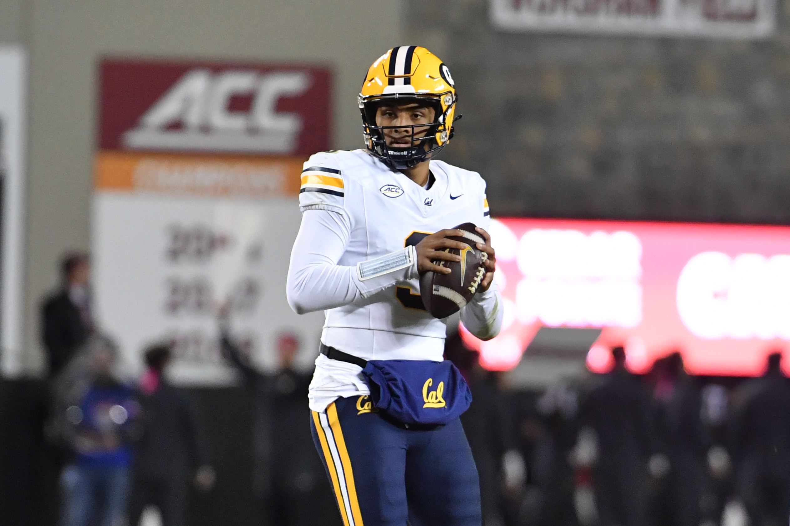 Oct 24, 2025; Blacksburg, Virginia, USA; California Golden Bears quarterback Jaron-Keawe Sagapolutele (3) looks to throw a pass against the Virginia Tech Hokies during the second quarter at Lane Stadium. Mandatory Credit: Brian Bishop-Imagn Images