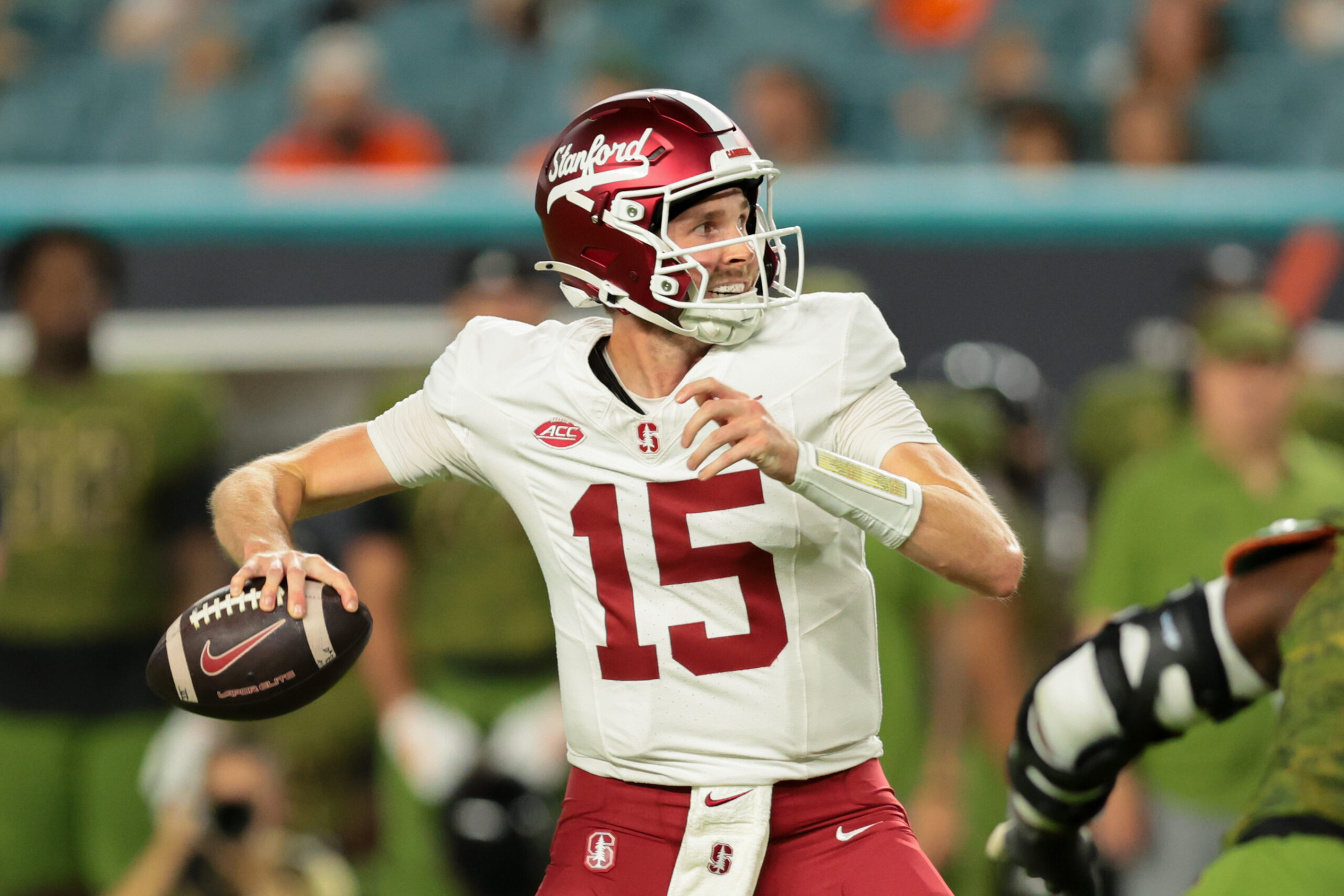 Oct 25, 2025; Miami Gardens, Florida, USA; Stanford Cardinal quarterback Ben Gulbranson (15) throws the football against the Miami Hurricanes during the first quarter at Hard Rock Stadium. Mandatory Credit: Sam Navarro-Imagn Images
