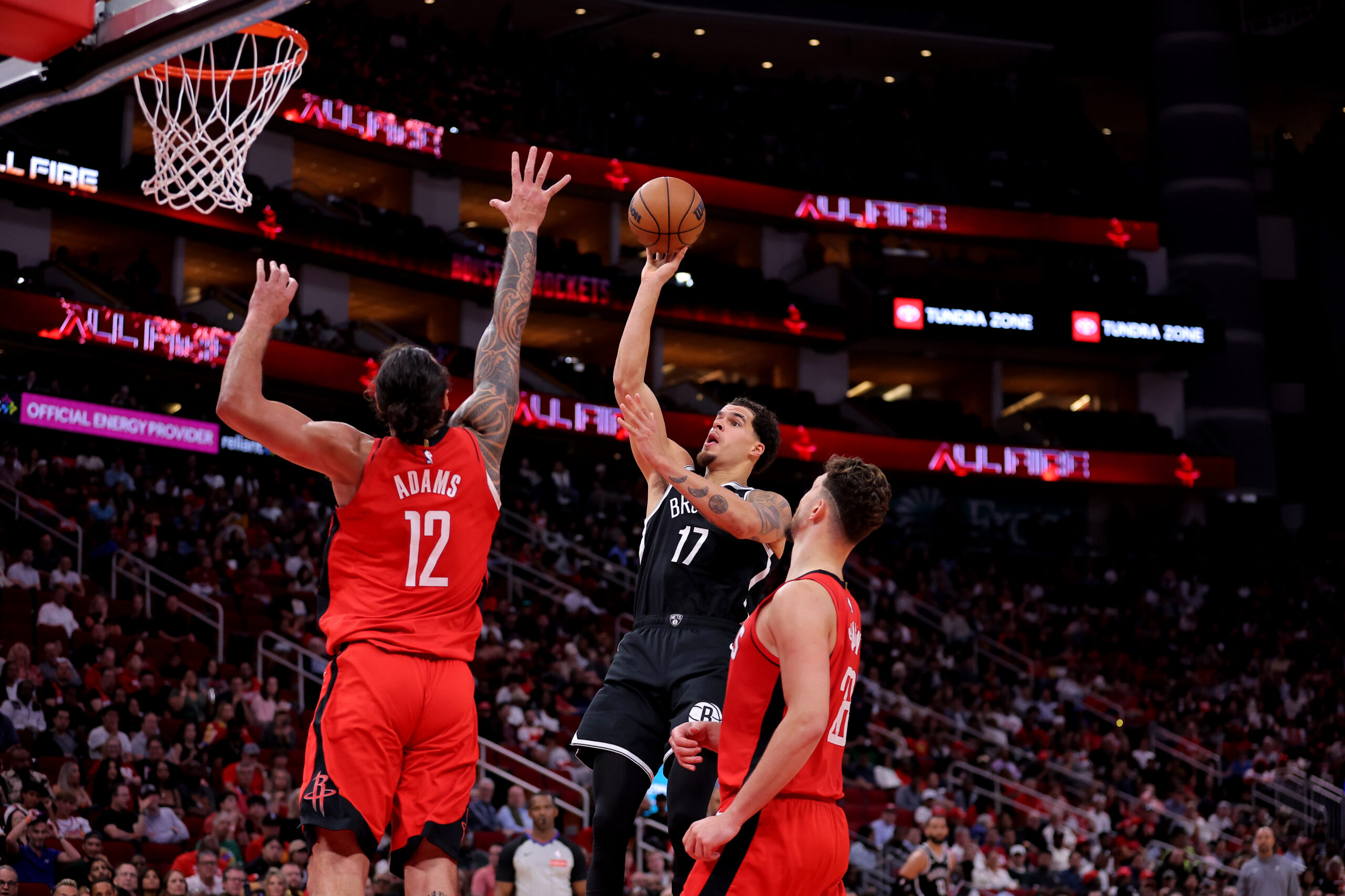 Oct 27, 2025; Houston, Texas, USA; Brooklyn Nets forward Michael Porter Jr. (17) shoots inside against Houston Rockets forward Tari Eason (17) during the third quarter at Toyota Center. Mandatory Credit: Erik Williams-Imagn Images