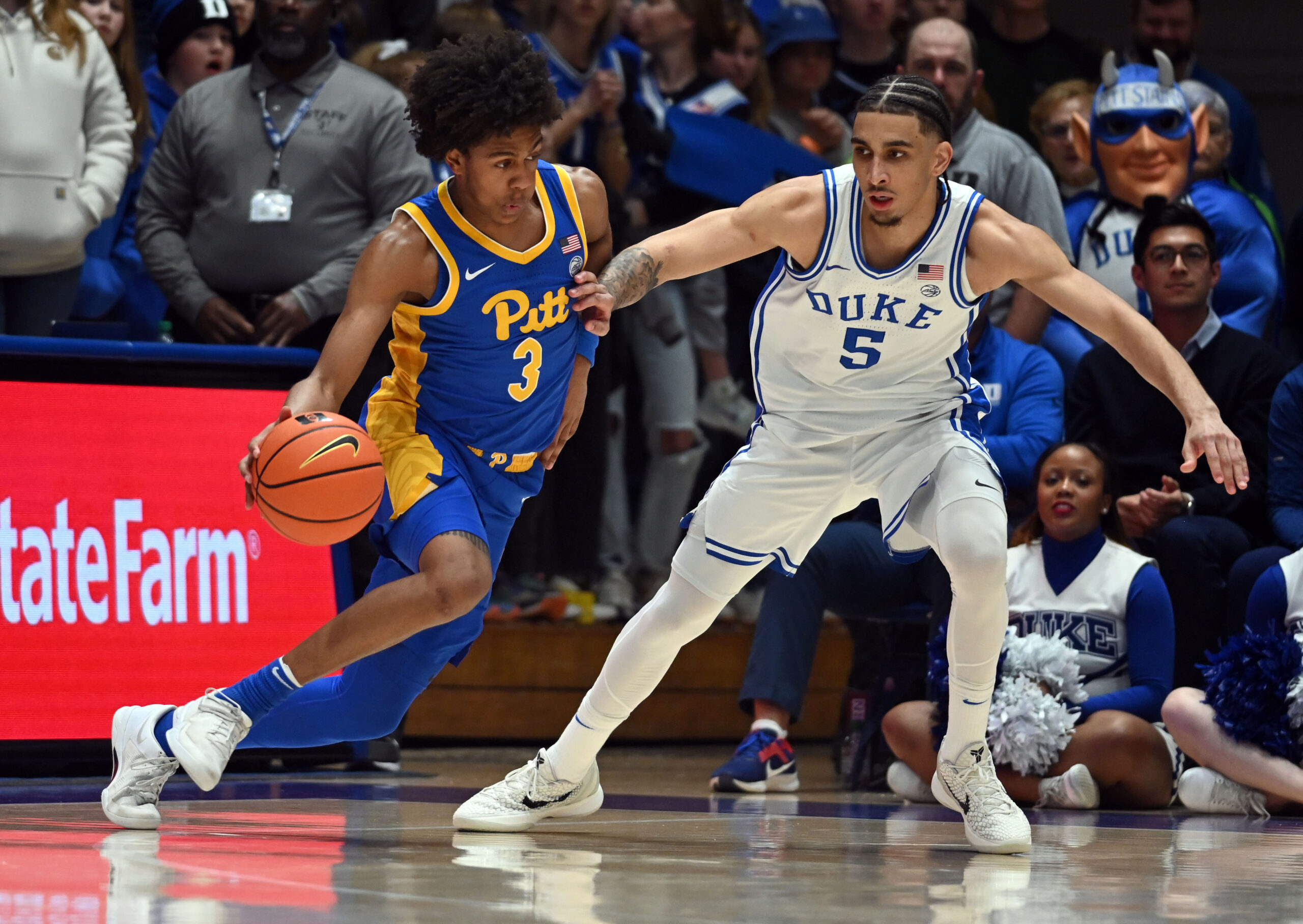 Jan 7, 2025; Durham, North Carolina, USA; Pitt Panthers guard Brandin Cummings (3) drives to the basket as Duke Blue Devils guard Tyrese Proctor (5) defends during the second half at Cameron Indoor Stadium. Mandatory Credit: Rob Kinnan-Imagn Images