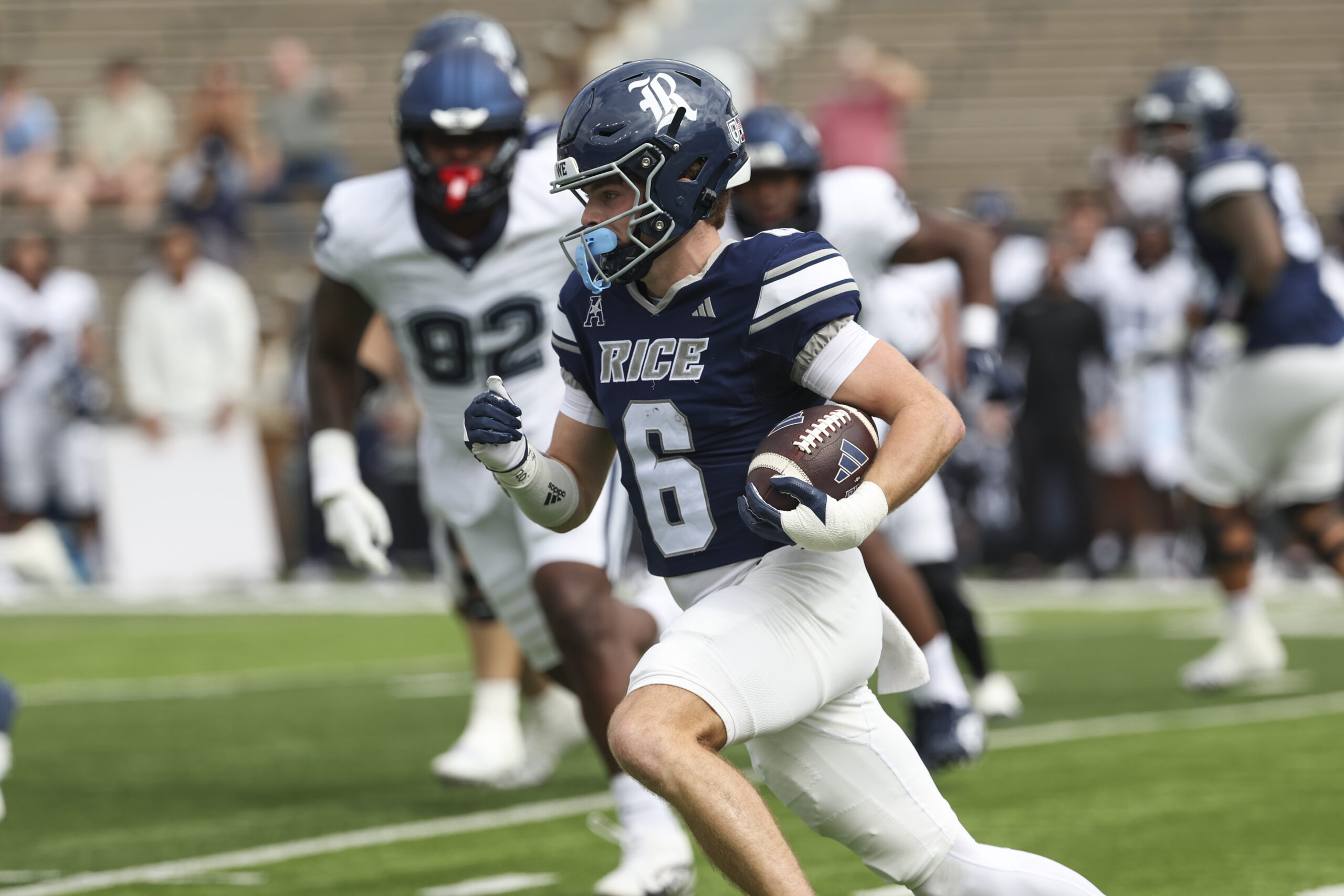 Oct 25, 2025; Houston, Texas, USA; Rice Owls wide receiver Drayden Dickmann (6) runs with the ball during the first quarter against the UConn Huskies at Rice Stadium. Mandatory Credit: Troy Taormina-Imagn Images