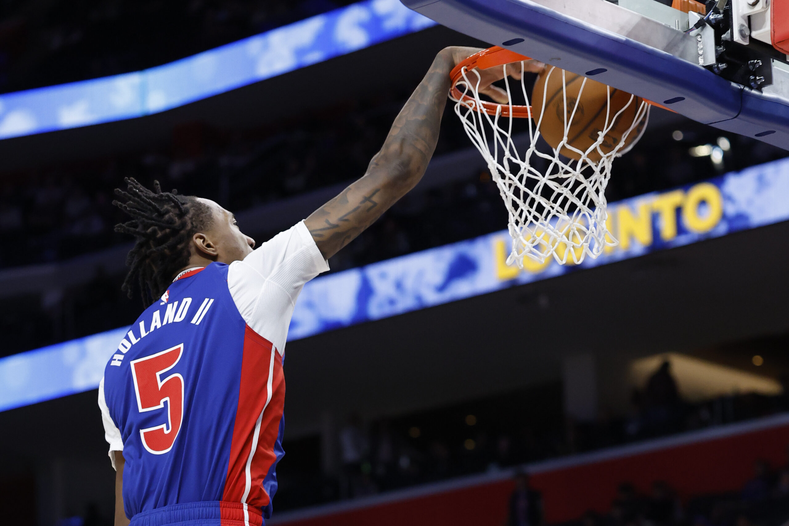 Oct 29, 2025; Detroit, Michigan, USA; Detroit Pistons forward Ronald Holland II (5) dunks in the second half against the Orlando Magic at Little Caesars Arena. Mandatory Credit: Rick Osentoski-Imagn Images