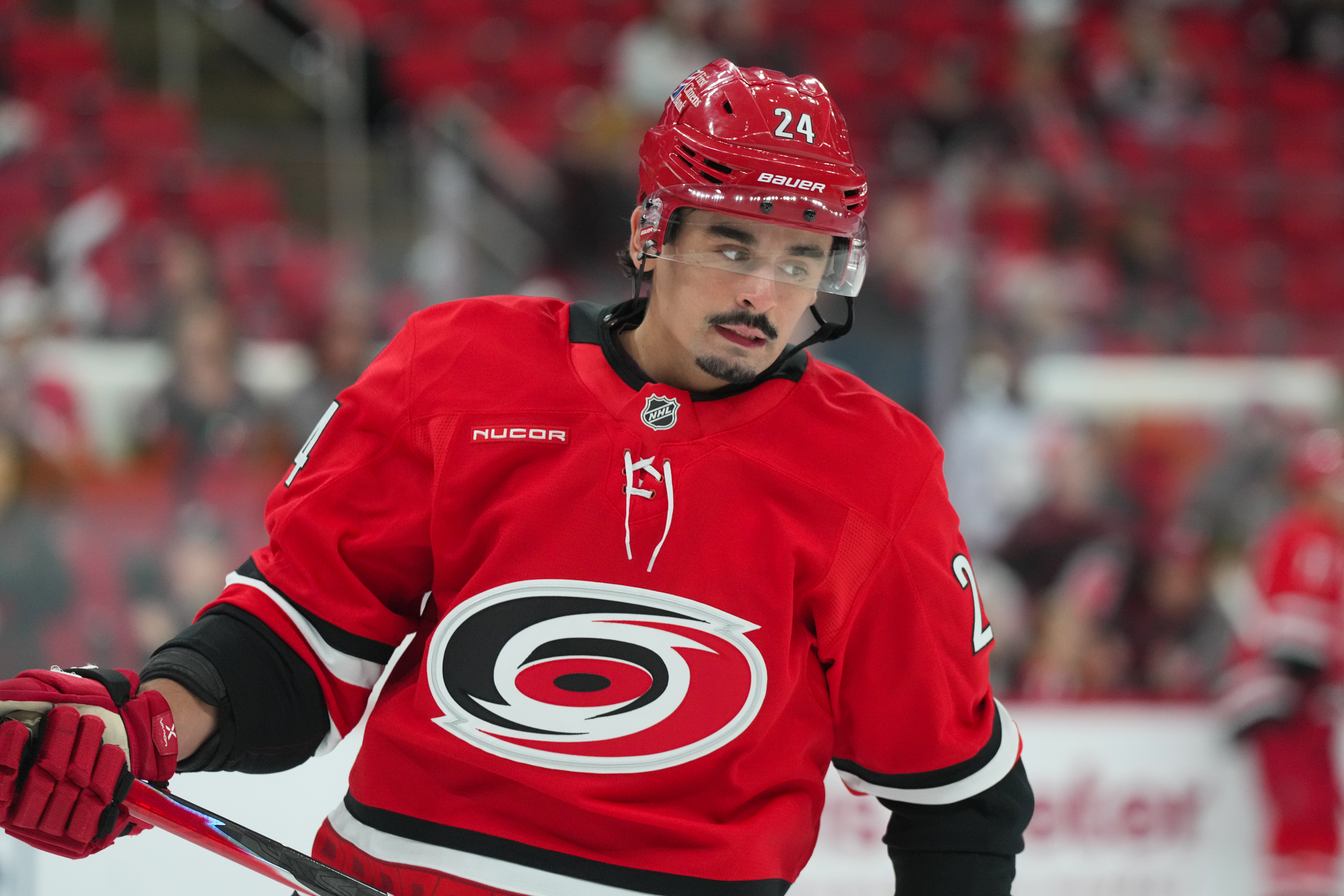 Oct 30, 2025; Raleigh, North Carolina, USA;  Carolina Hurricanes center Seth Jarvis (24) skates during the warmups before the game against the New York Islanders at Lenovo Center. Mandatory Credit: James Guillory-Imagn Images