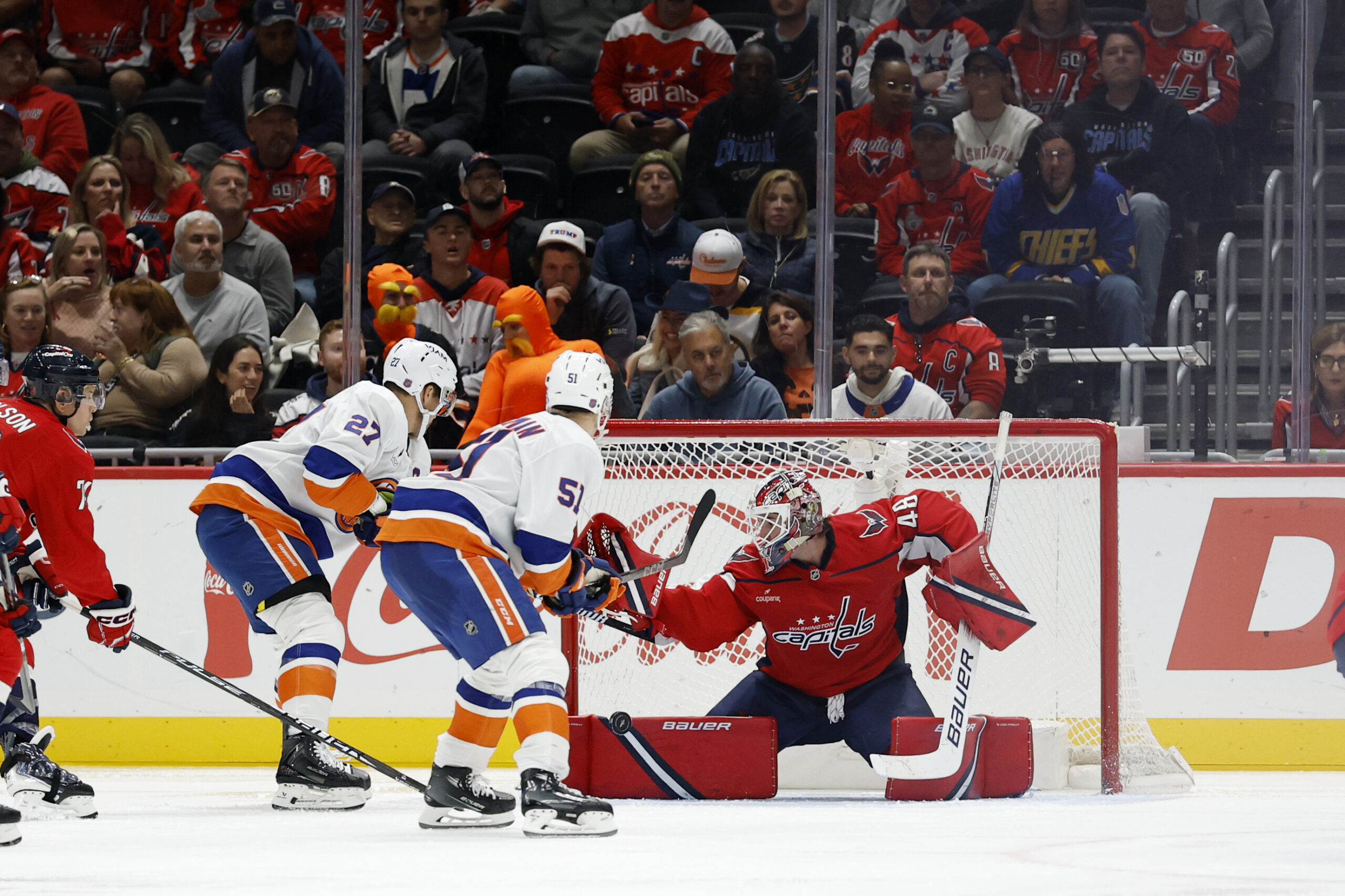 Oct 31, 2025; Washington, District of Columbia, USA; Washington Capitals goaltender Logan Thompson (48) makes a save against on New York Islanders left wing Anders Lee (27) during the third period at Capital One Arena. Mandatory Credit: Geoff Burke-Imagn Images