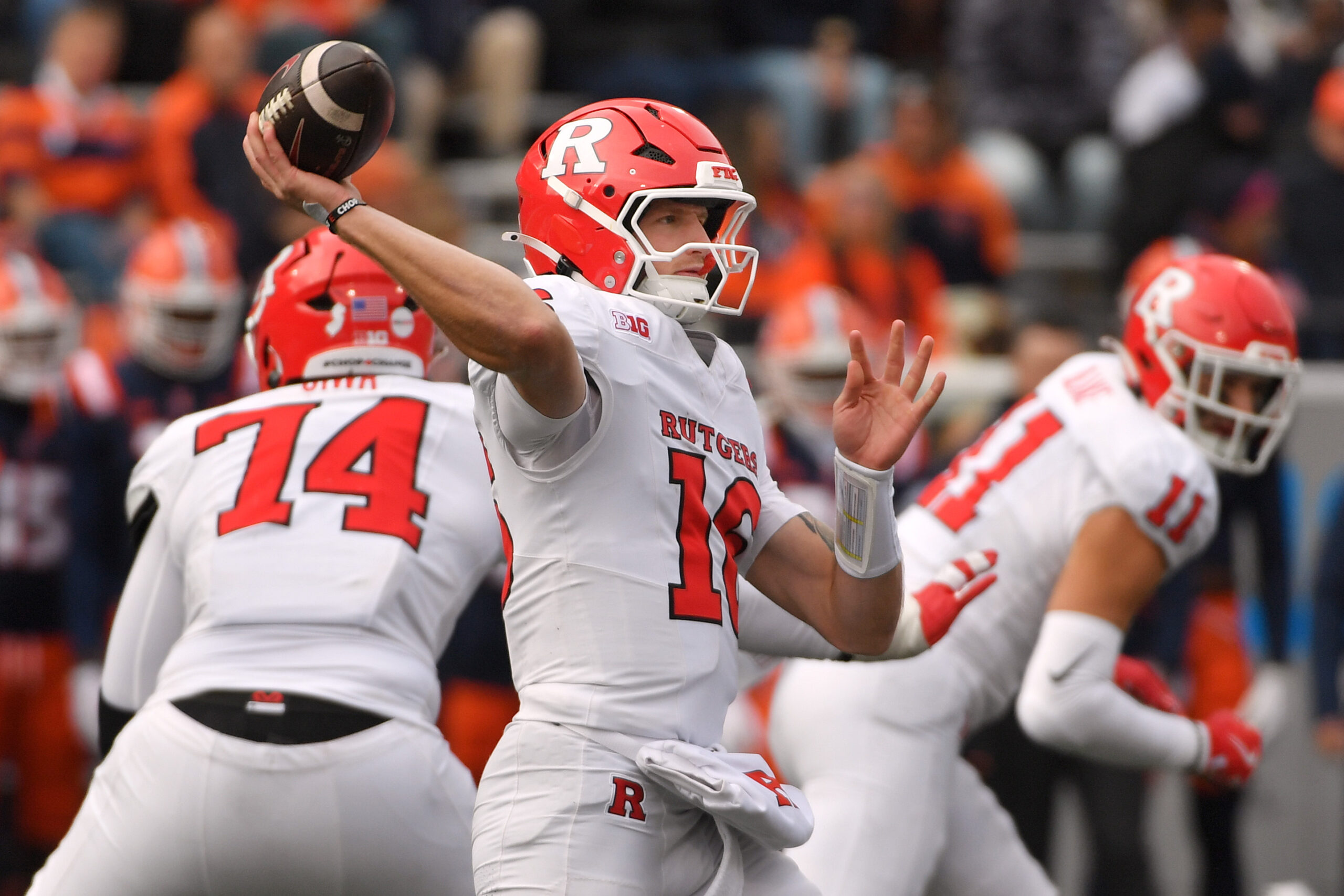 Nov 1, 2025; Champaign, Illinois, USA;  Rutgers Scarlet Knights quarterback Athan Kaliakmanis (16) passes the ball during the second half against the Illinois Fighting Illini  at Memorial Stadium. Mandatory Credit: Ron Johnson-Imagn Images