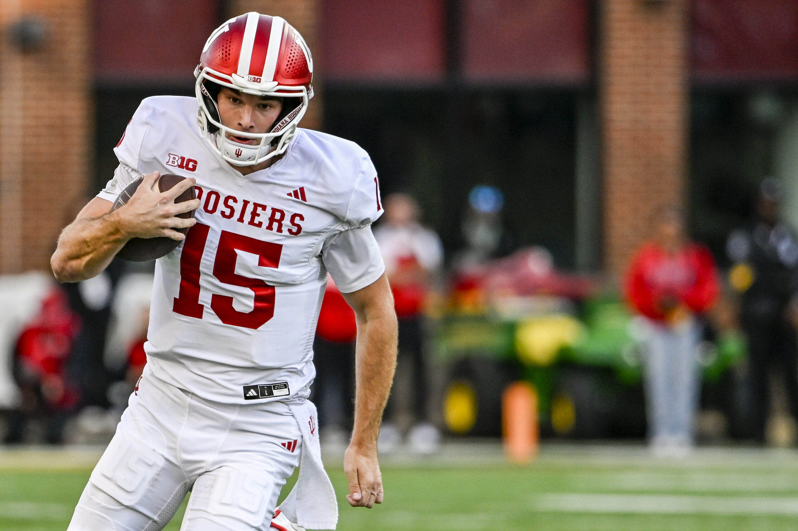 Nov 1, 2025; College Park, Maryland, USA;  
Indiana Hoosiers quarterback Fernando Mendoza (15) rushes during the first half against the Maryland Terrapins at SECU Stadium. Mandatory Credit: Tommy Gilligan-Imagn Images