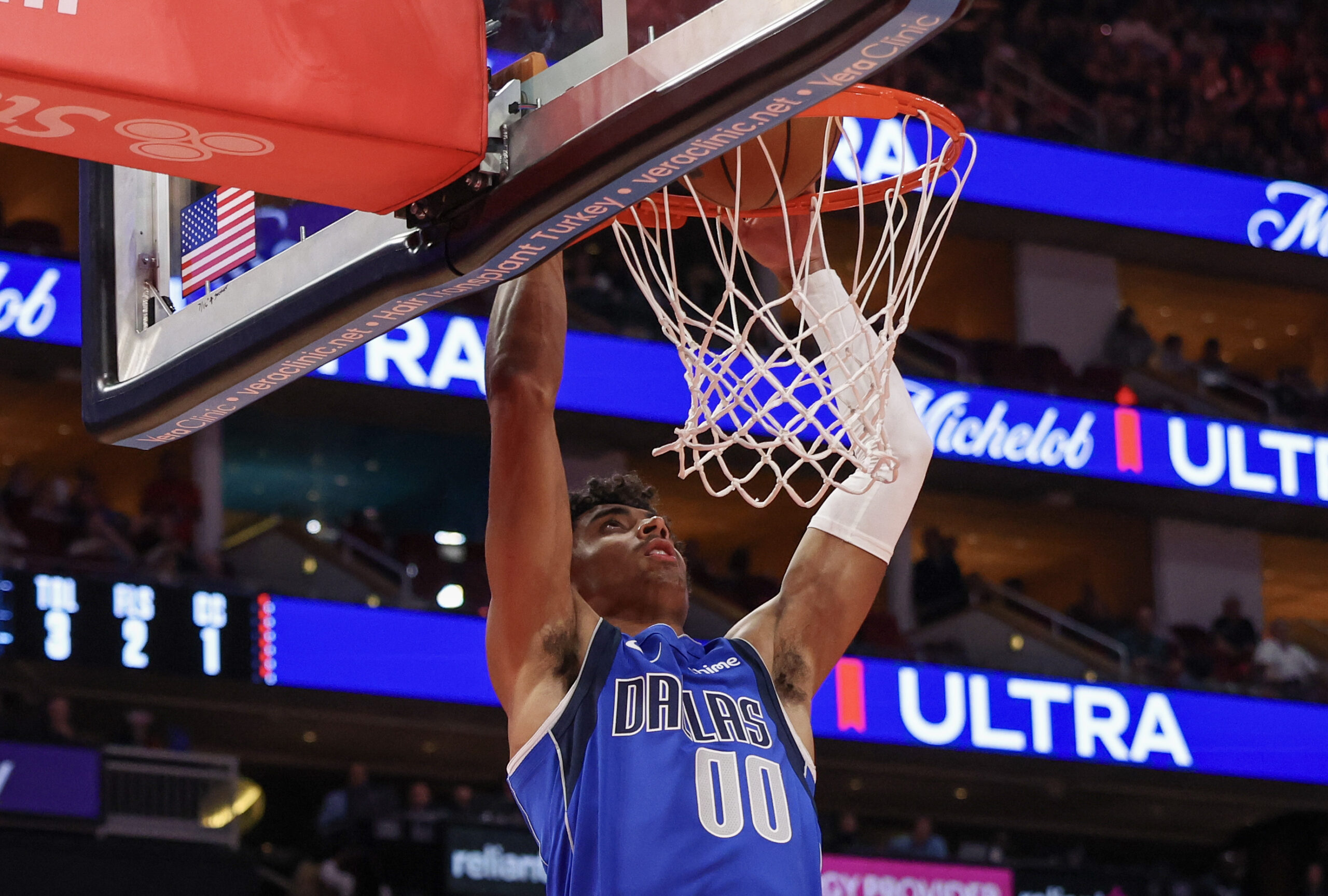 Nov 3, 2025; Houston, Texas, USA; Dallas Mavericks guard Max Christie (00) dunks against the Houston Rockets in the fourth quarter at Toyota Center. Mandatory Credit: Thomas Shea-Imagn Images