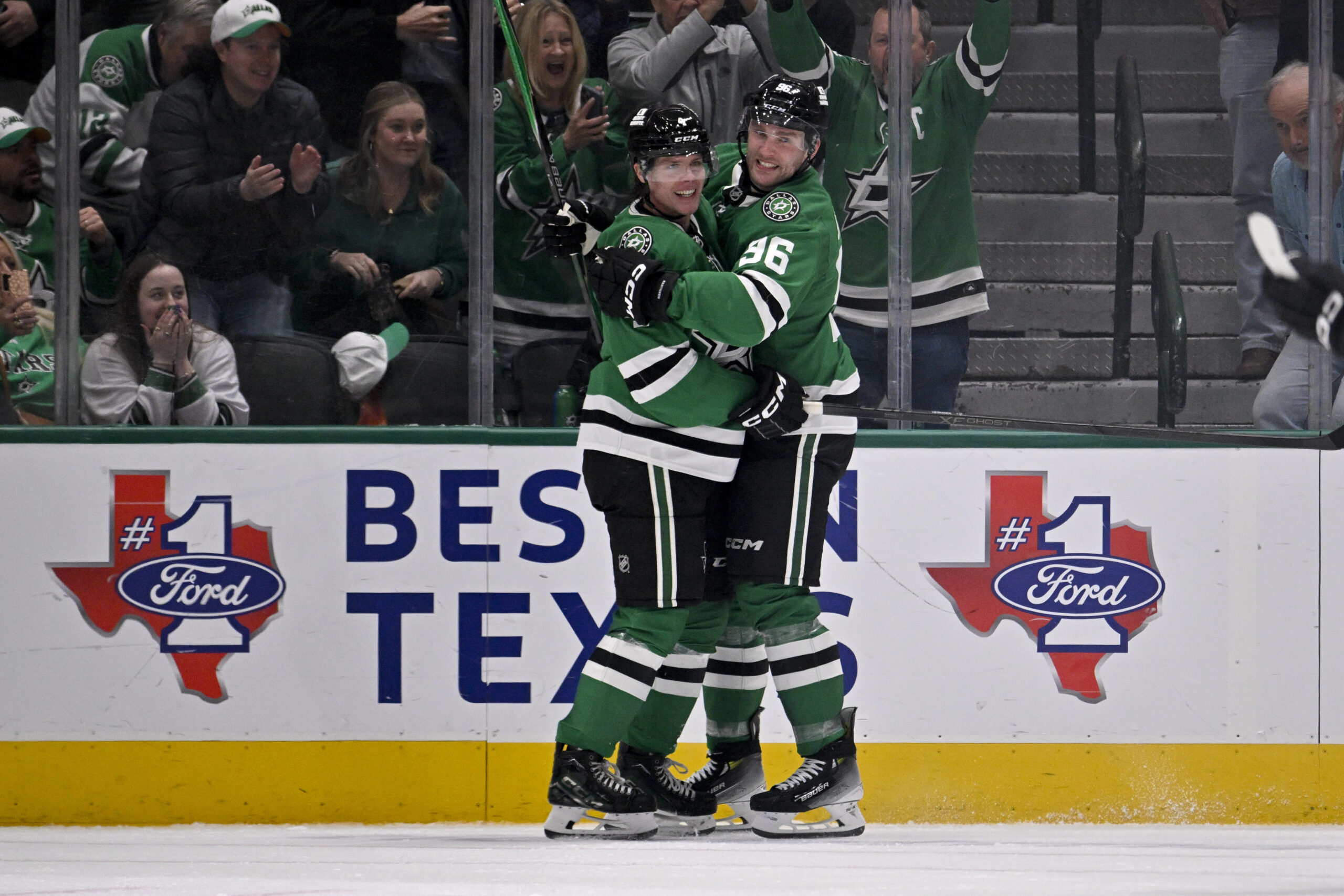 Nov 4, 2025; Dallas, Texas, USA; Dallas Stars defenseman Miro Heiskanen (4) and right wing Mikko Rantanen (96) celebrates the game tying goal scored by Heiskanen against the Edmonton Oilers during the third period at the American Airlines Center. Mandatory Credit: Jerome Miron-Imagn Images