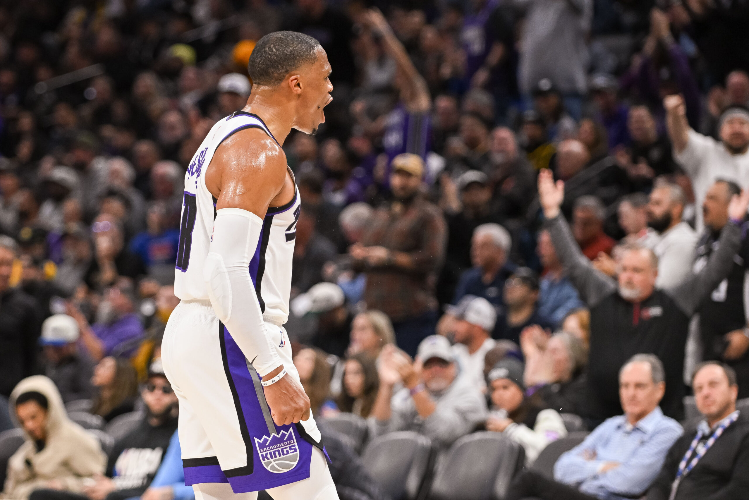 Nov 5, 2025; Sacramento, California, USA; Sacramento Kings guard Russell Westbrook (18) celebrates after scoring against the Golden State Warriors during the third quarter at Golden 1 Center. Mandatory Credit: Ed Szczepanski-Imagn Images