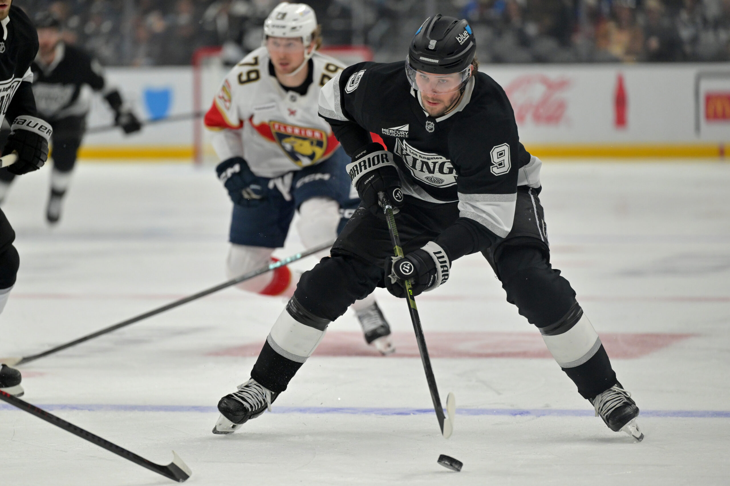 Nov 6, 2025; Los Angeles, California, USA; Los Angeles Kings right wing Adrian Kempe (9) handles the puck during the second period against the Florida Panthers at Crypto.com Arena. Mandatory Credit: Jayne Kamin-Oncea-Imagn Images