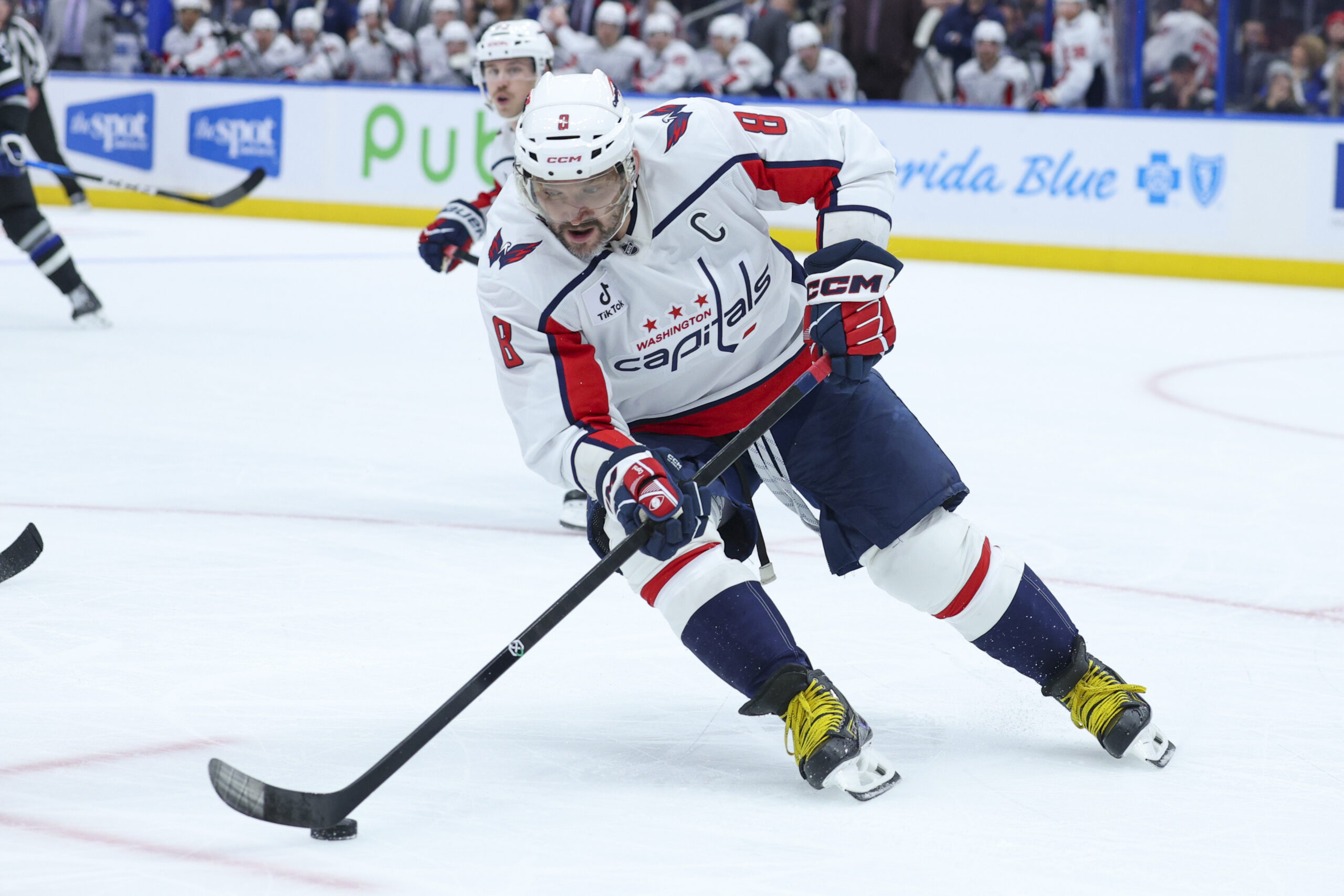 Nov 8, 2025; Tampa, Florida, USA; Washington Capitals left wing Alex Ovechkin (8) controls the puck against the Tampa Bay Lightning in the third period at Benchmark International Arena. Mandatory Credit: Nathan Ray Seebeck-Imagn Images