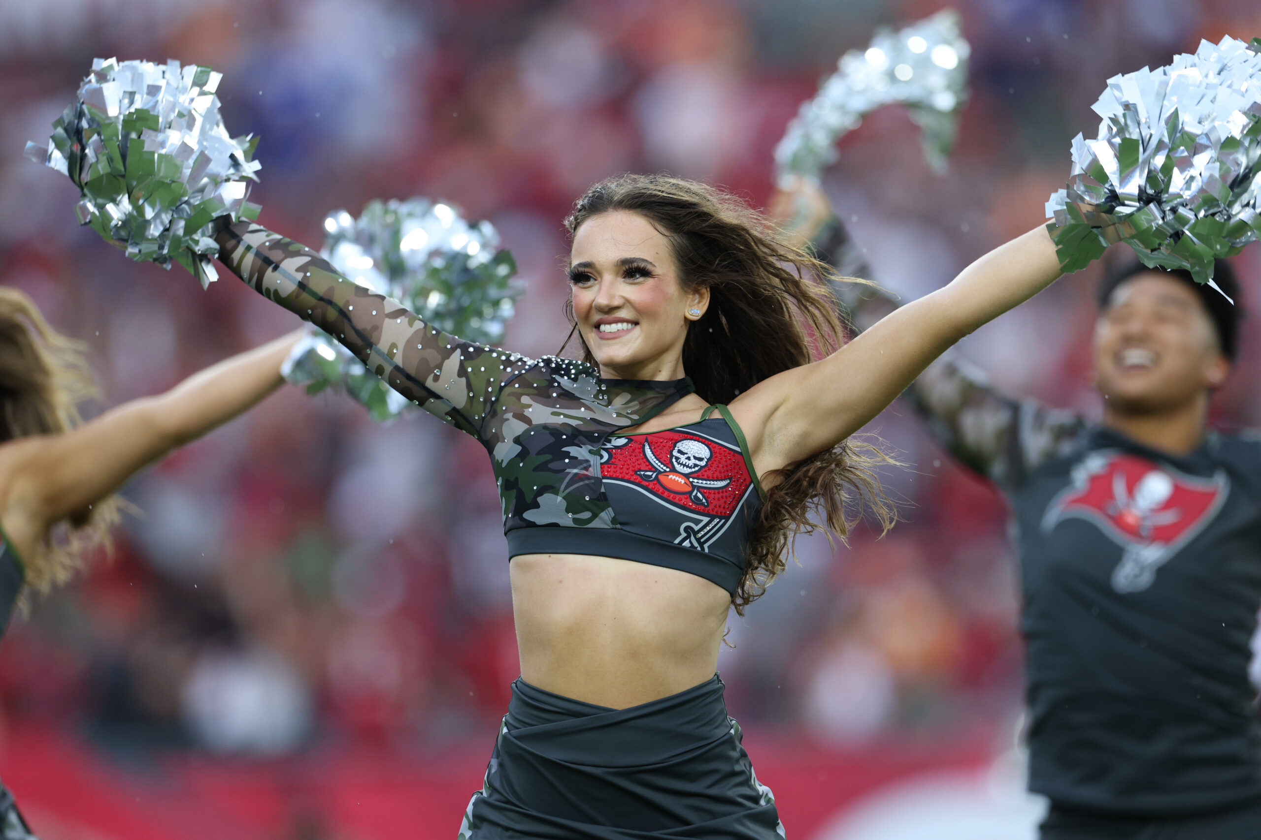 Nov 9, 2025; Tampa, Florida, USA; A Tampa Bay Buccaneers cheerleader performs during the third quarter against the New England Patriots at Raymond James Stadium. Mandatory Credit: Nathan Ray Seebeck-Imagn Images